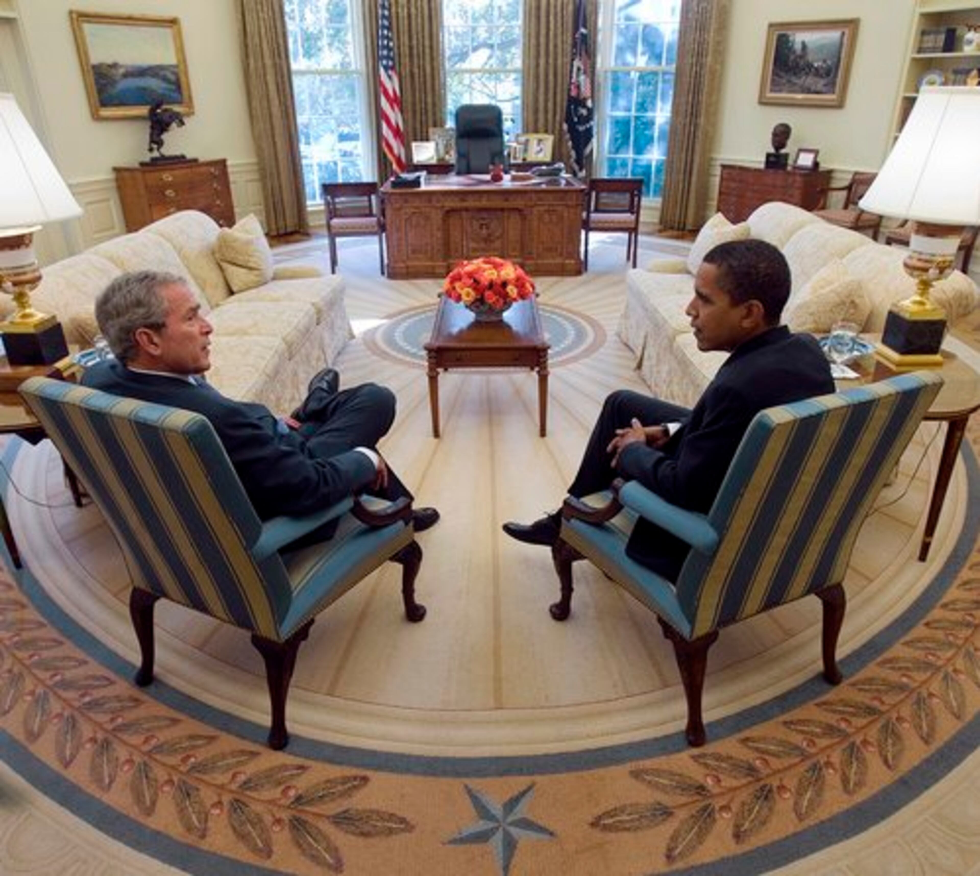 In this photo released by the White House, President Bush and President-elect Obama meet in the Oval Office.