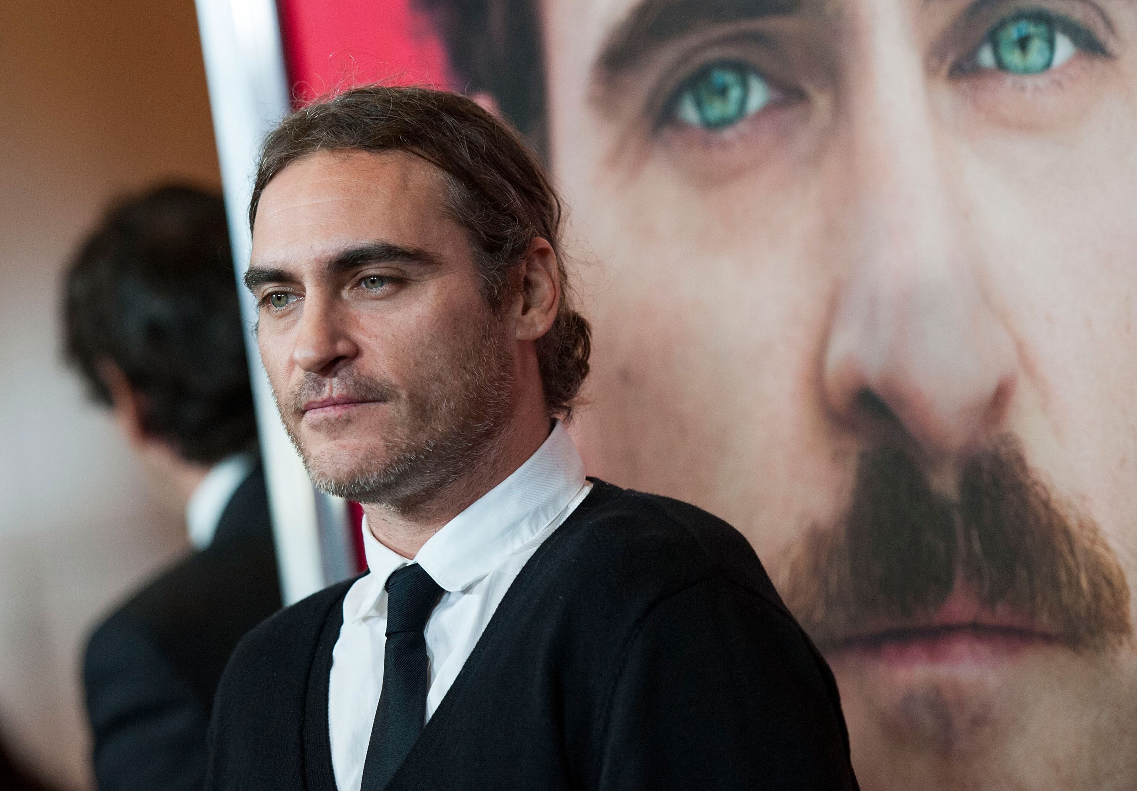 Actor Joaquin Phoenix attends the premiere of Warner Bros. Pictures' "Her." at DGA Theater on December 12, 2013 in Los Angeles, California.