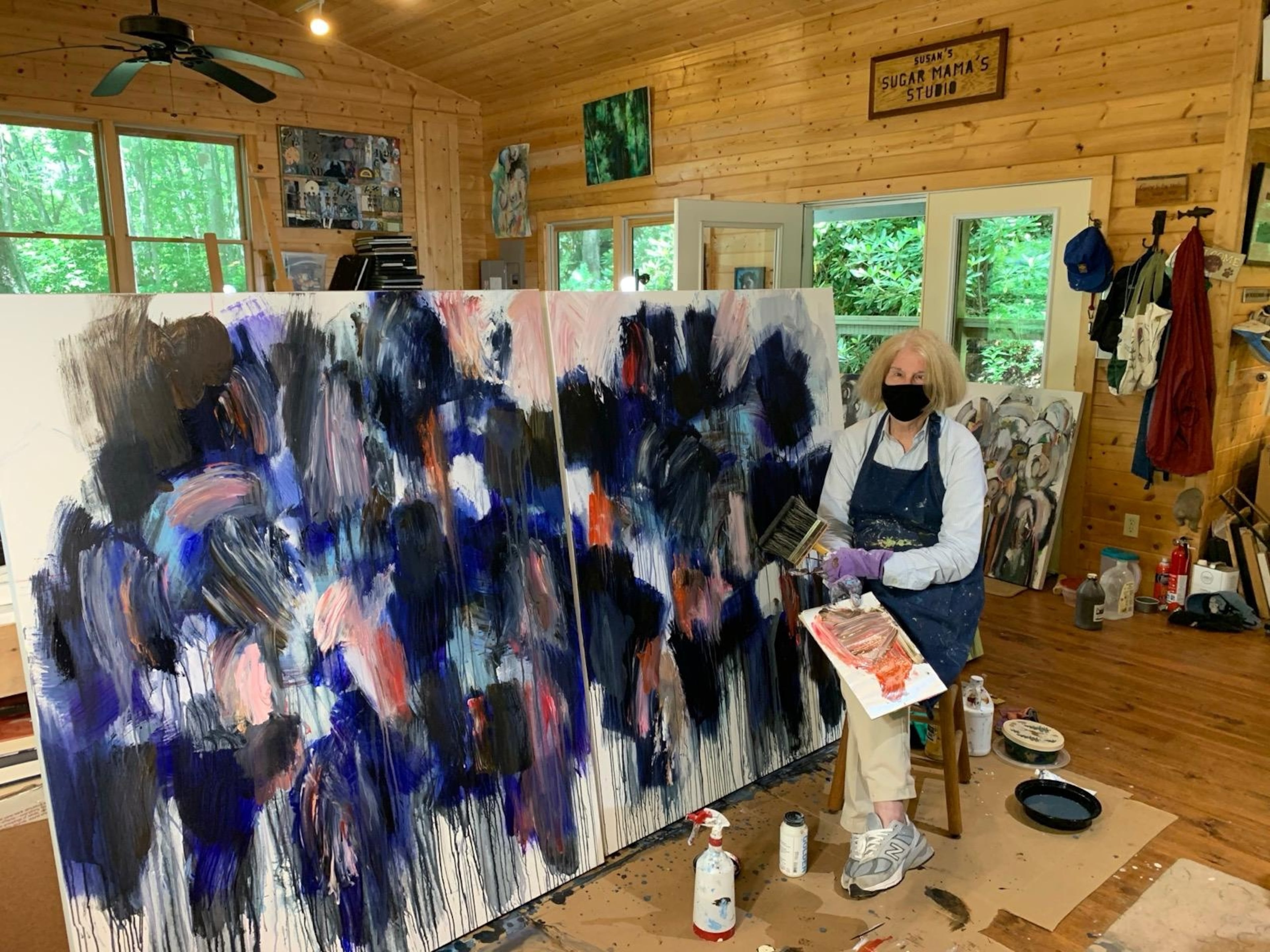 "Tired of cleaning up people’s messes,” Susan Robert gave up her career as a contract lawyer to pursue art. She's shown here working in her Highlands, North Carolina, studio. (Courtesy of Birney Robert)