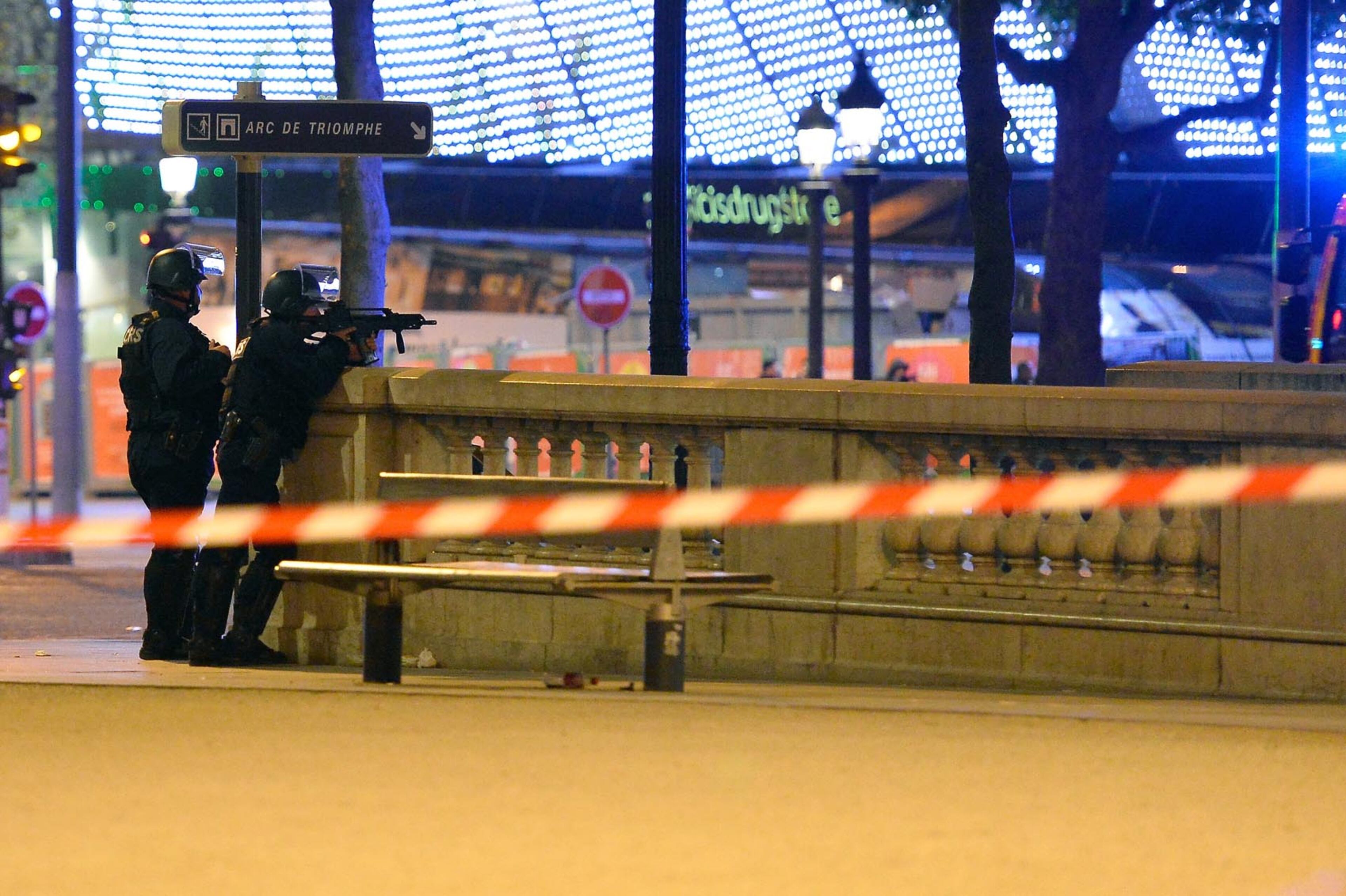 PARIS, FRANCE - APRIL 20: Police officers secure the area after a gunman opened fire on Champs Elysees on April 20, 2017 in Paris, France. One police officer has been killed, and a second injured by a gunman on The Champs Elysees. Security is heightened in Paris with the first round of France's presidential election on Sunday. (Photo by Aurelien Meunier/Getty Images)