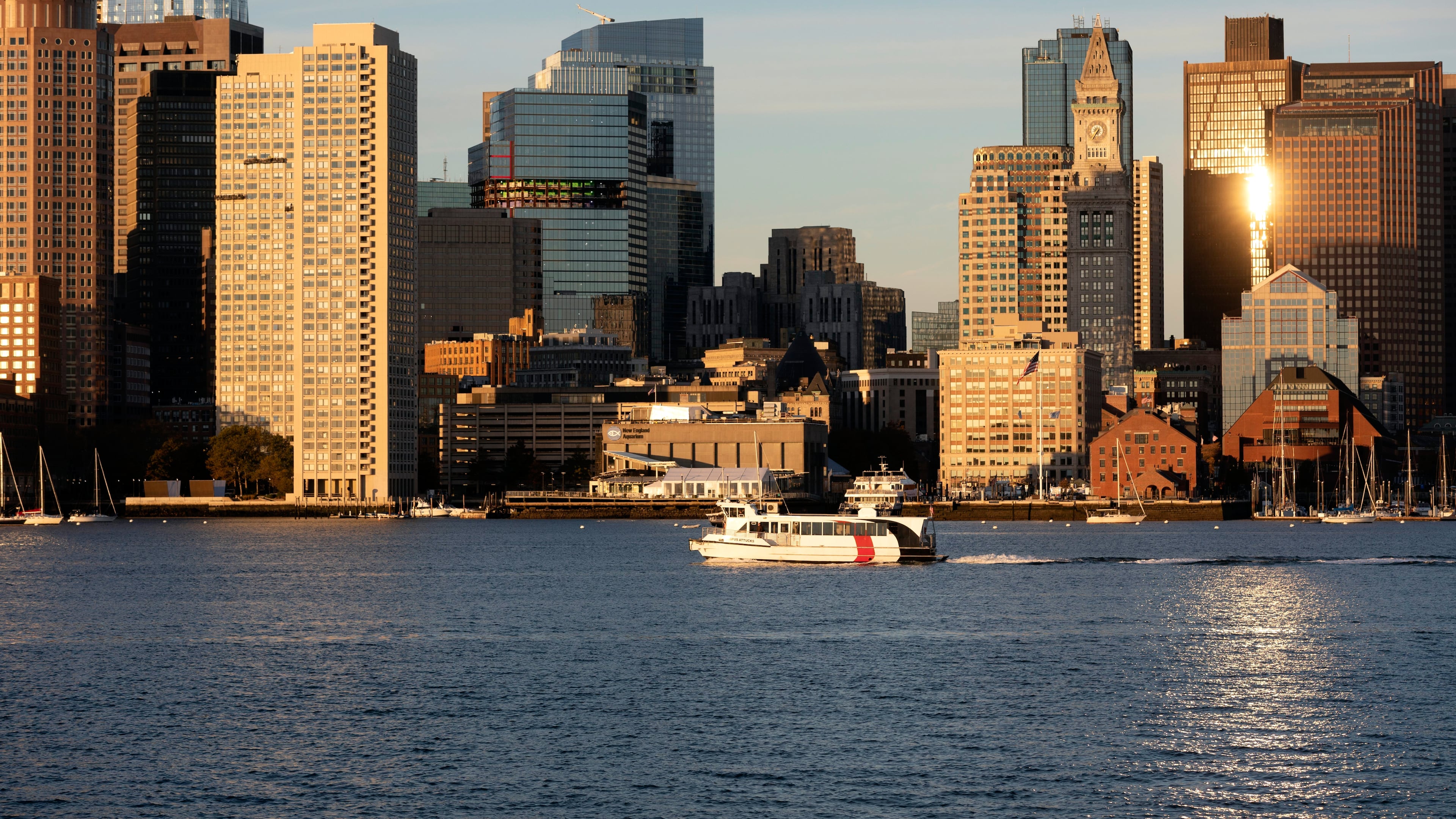 FILE - The Boston harbor and the city skyline are photographed, Oct. 28, 2022, in Boston. (AP Photo/Michael Dwyer, File)
