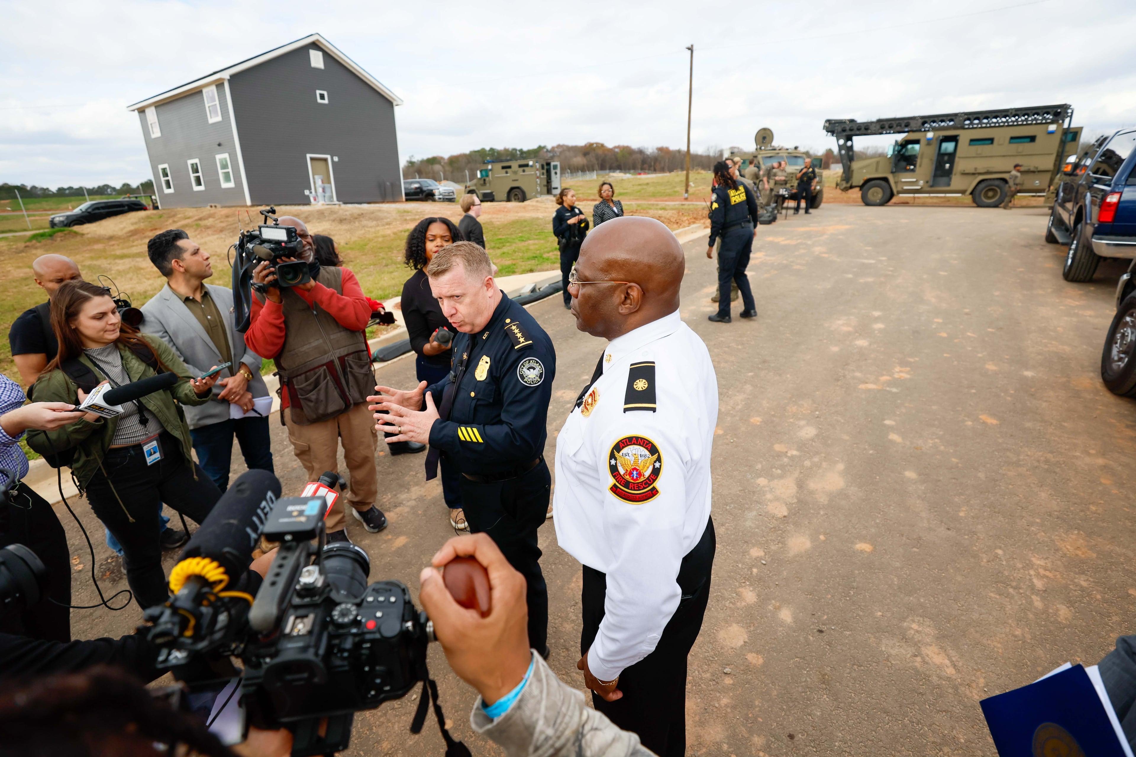 Atlanta Police Chief Darin Schierbaum, accompanied by Atlanta Fire Chief Roderick Smith, provided an update to the press during a media tour at the Atlanta Public Safety Training Center, 2024. (Miguel Martinez/AJC)