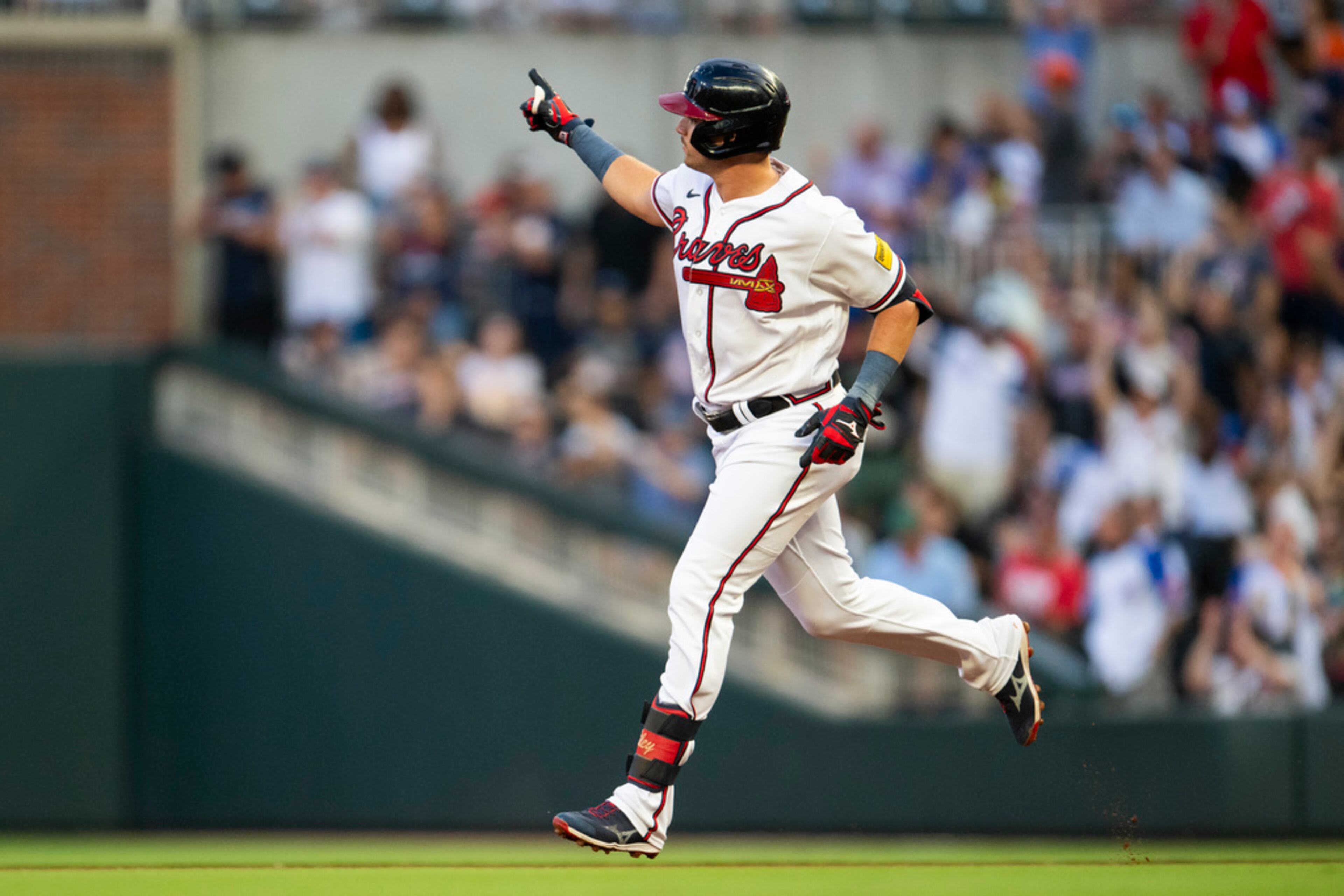 Atlanta Braves' Austin Riley gestures while running the bases after a solo home run in the first inning of a baseball game against the New York Yankees, Monday, Aug. 14, 2023, in Atlanta. The Braves cruised 11-3. (AP Photo/Hakim Wright Sr.)
