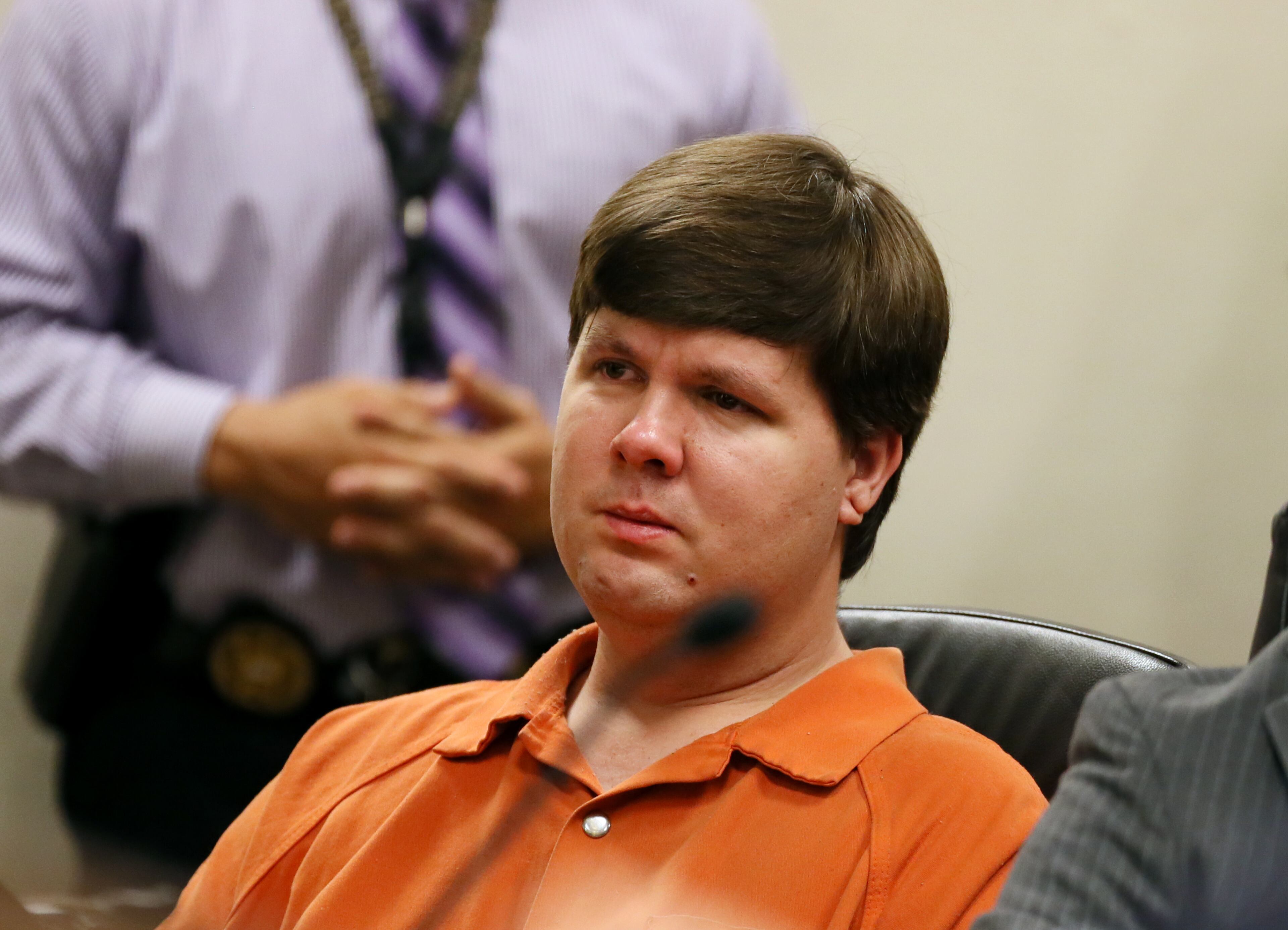 Justin Ross Harris, the father of a toddler who died after police say he was left in a hot car for about seven hours, sits for his bond hearing in Cobb County Magistrate Court, Thursday, July 3, 2014, in Marietta, Ga. (AP Photo/Marietta Daily Journal, Kelly J. Huff, Pool)