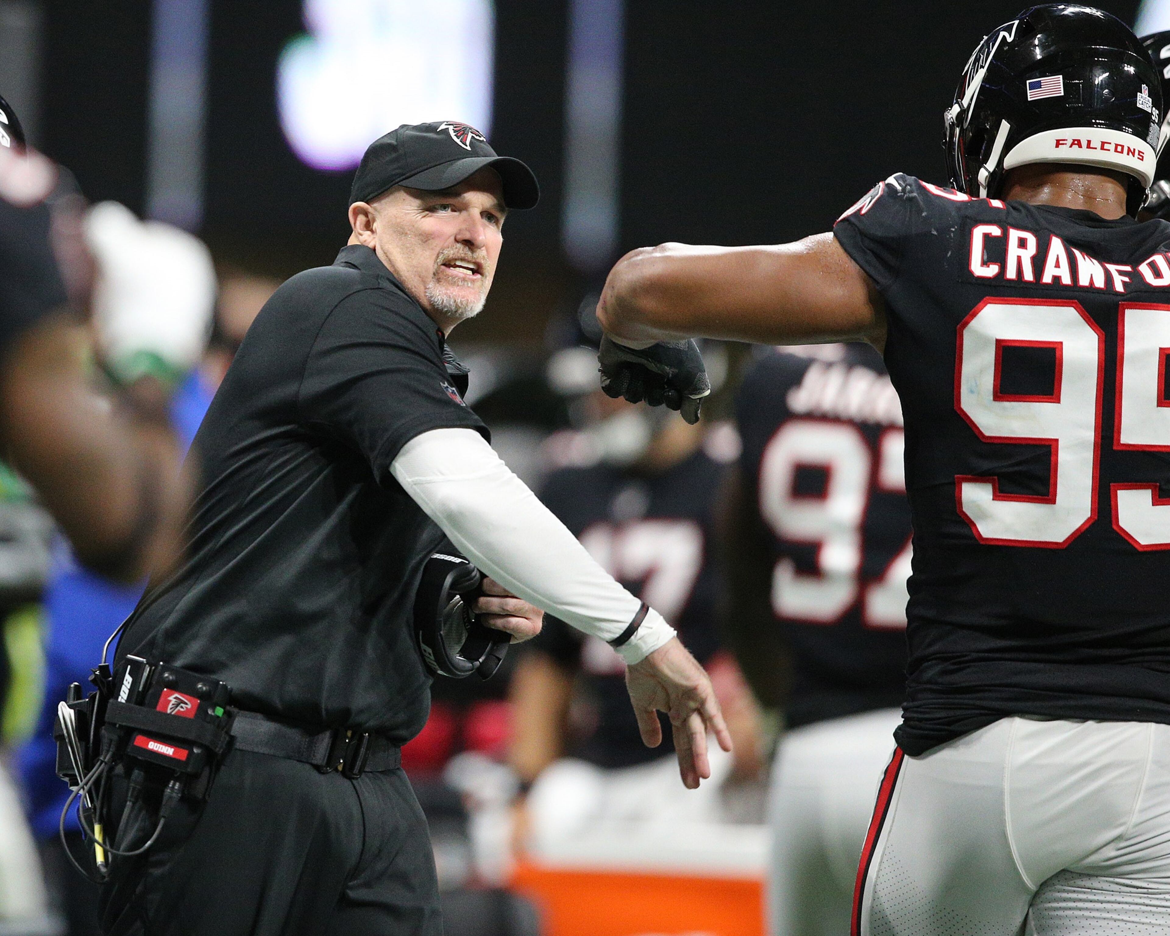October 22, 2018 Atlanta: Atlanta Falcons head coach Dan Quinn reacts after his defense held the New York Giants on a fourth and one attempt to take over on downs during the third quarter in a NFL football game on Monday, Oct 22, 2018, in Atlanta. Curtis Compton/ccompton@ajc.com