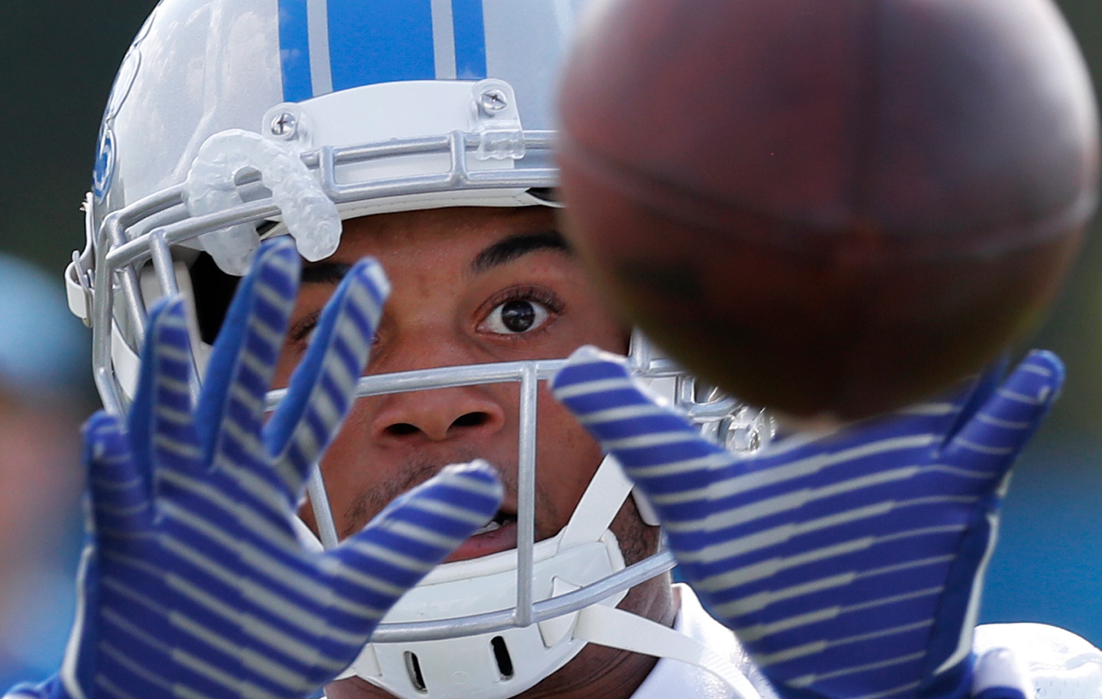 Detroit Lions cornerback Teez Tabor (30) catches a ball during NFL football training camp in Allen Park, Mich., Monday, July 31, 2017. (AP Photo/Paul Sancya)