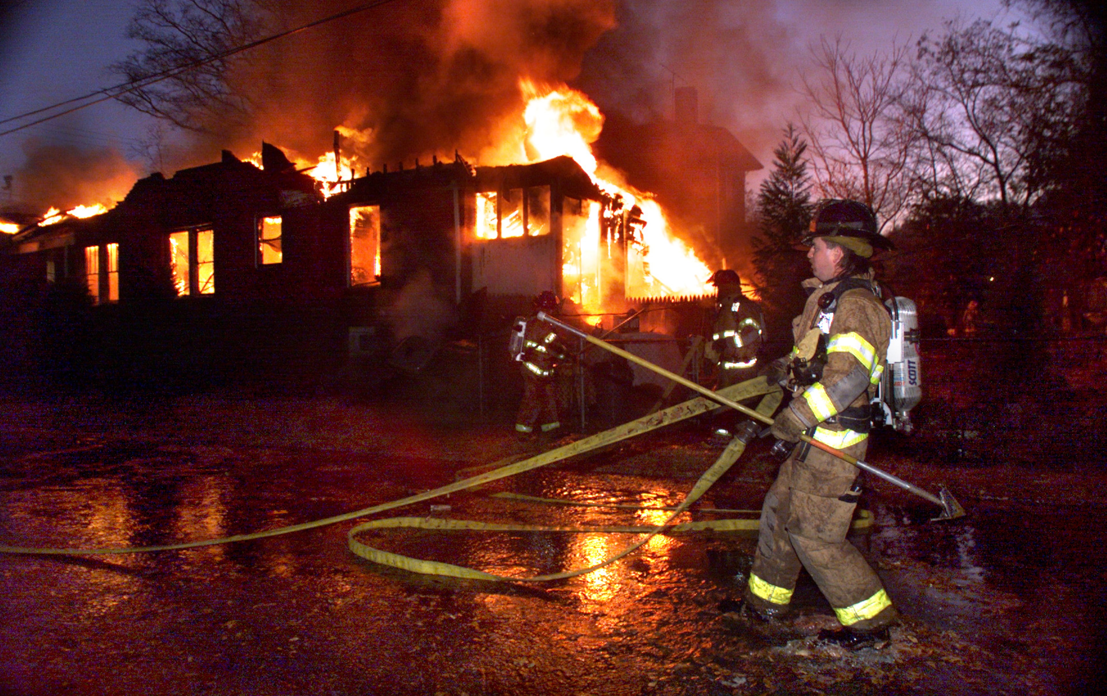 991202-12/02/99-JOHN SPINK/staff-ATLANTA/FULTON COUNTY-Atlanta Firefighters responded early Thursday morning to a raging house fire at 1035 Blue Ridge Avenue just off Ponce de Leon near the old Plaza Drugs where additional equipment and manpower was brought in to protect surrounding properties. An older man who lived in the home was unaccounted for by mid morning. The house which was full of furniture made initial primary searches next to impossible for firefighters. Cause of the blaze is under investigation. There were no fireifhgters injured during the blaze.