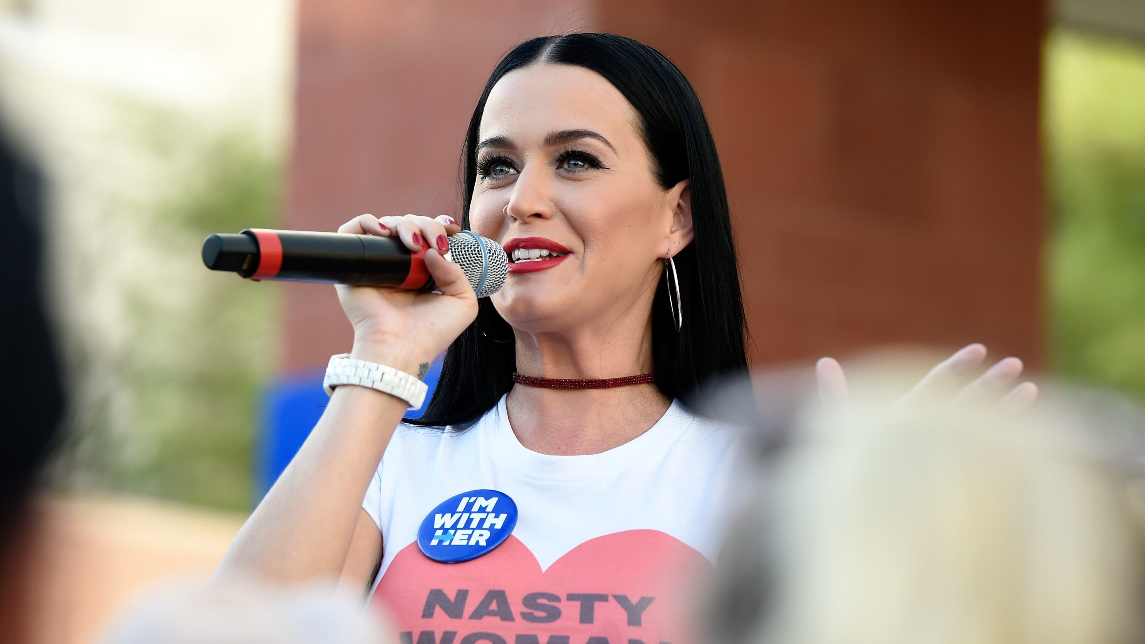 Singer Katy Perry spoke during a get out the early vote rally while campaigning for Hillary Clinton at UNLV on October 22, 2016 in Las Vegas, Nevada. She also dressed up as Clinton for Halloween. (Photo by David Becker/Getty Images)
