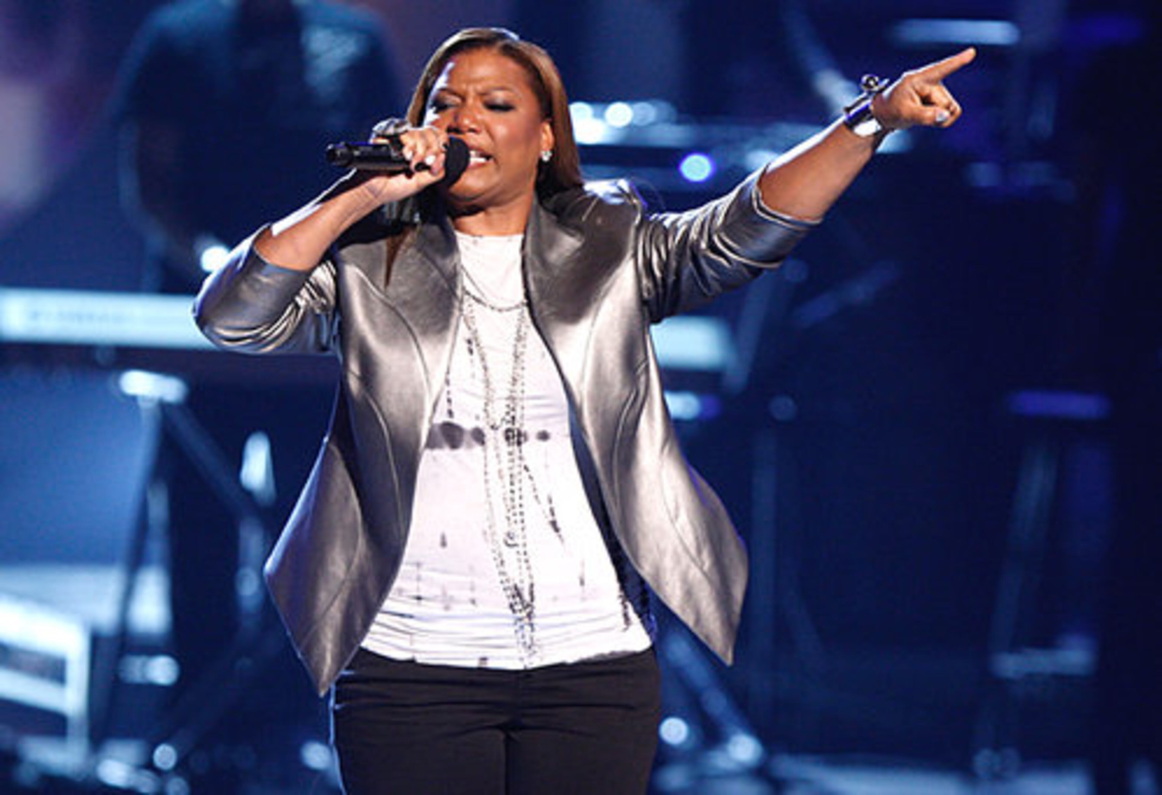 Singer Queen Latifah performs onstage.