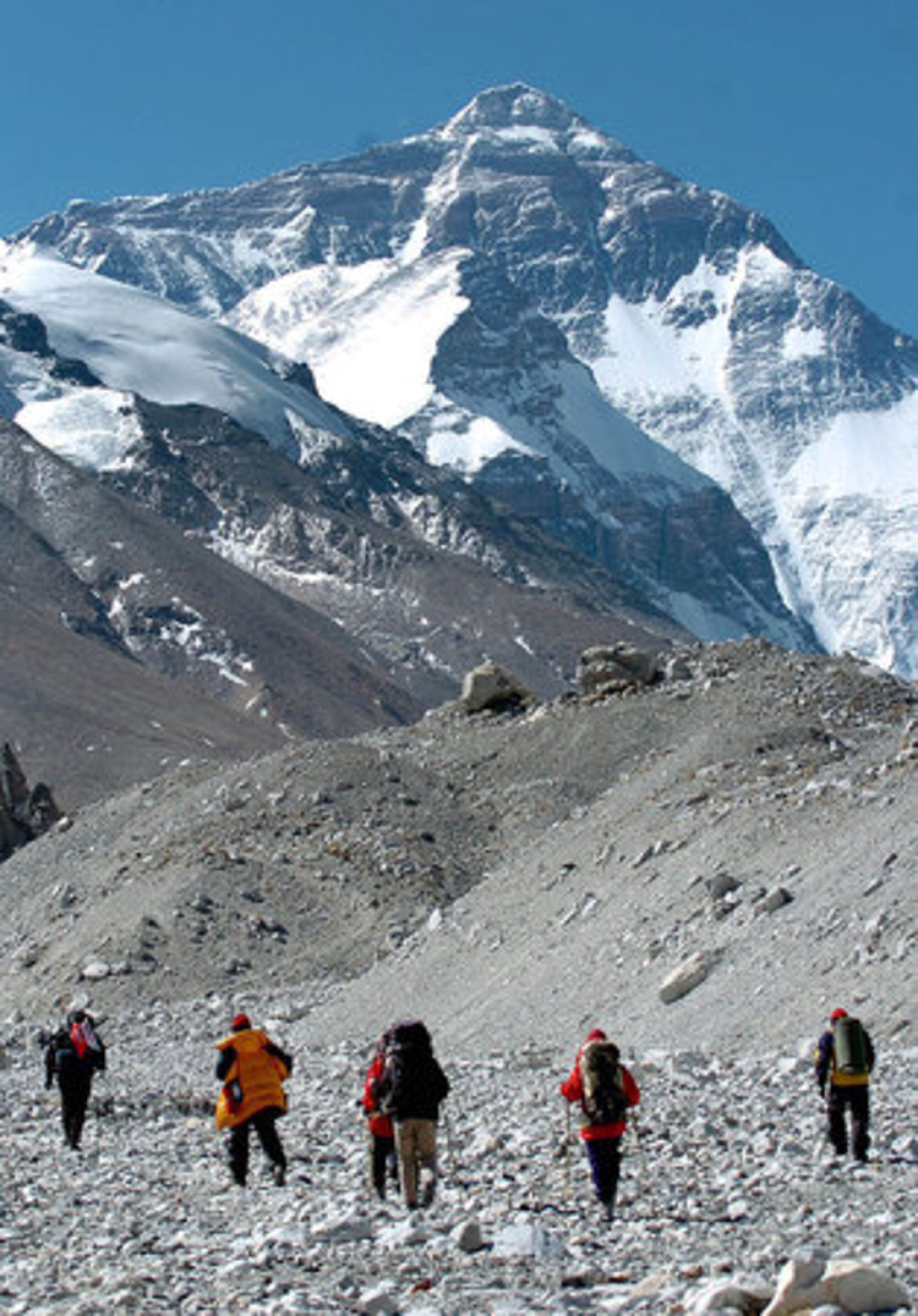 MOUNT EVEREST: In this photo, members of a Chinese expedition climb up the mountain to measure its height.