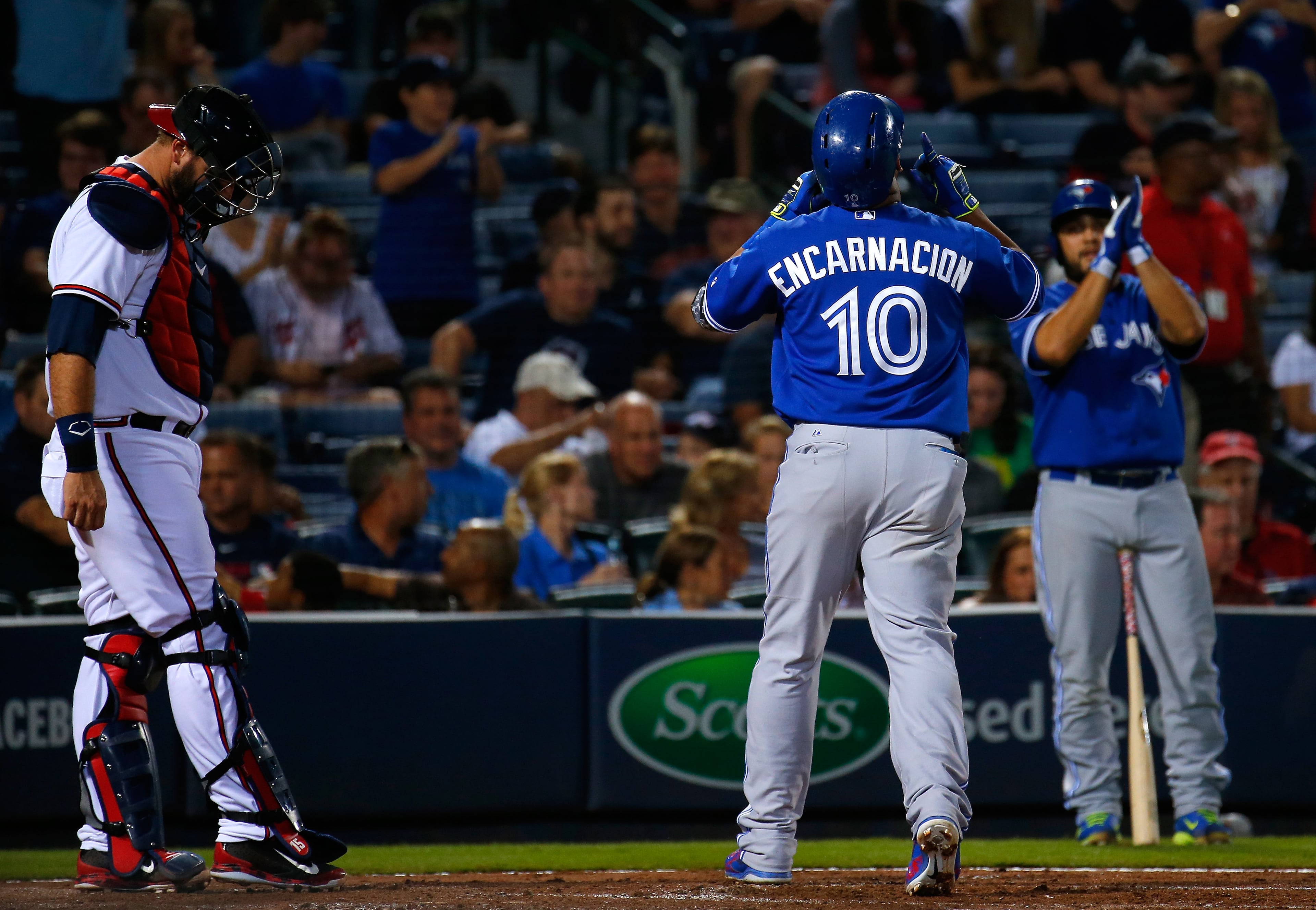 Edwin Encarnacion #10 of the Toronto Blue Jays reacts after hitting a solo homer in the fourth inning against the Atlanta Braves at Turner Field on September 17, 2015 in Atlanta, Georgia. (Photo by Kevin C. Cox/Getty Images)