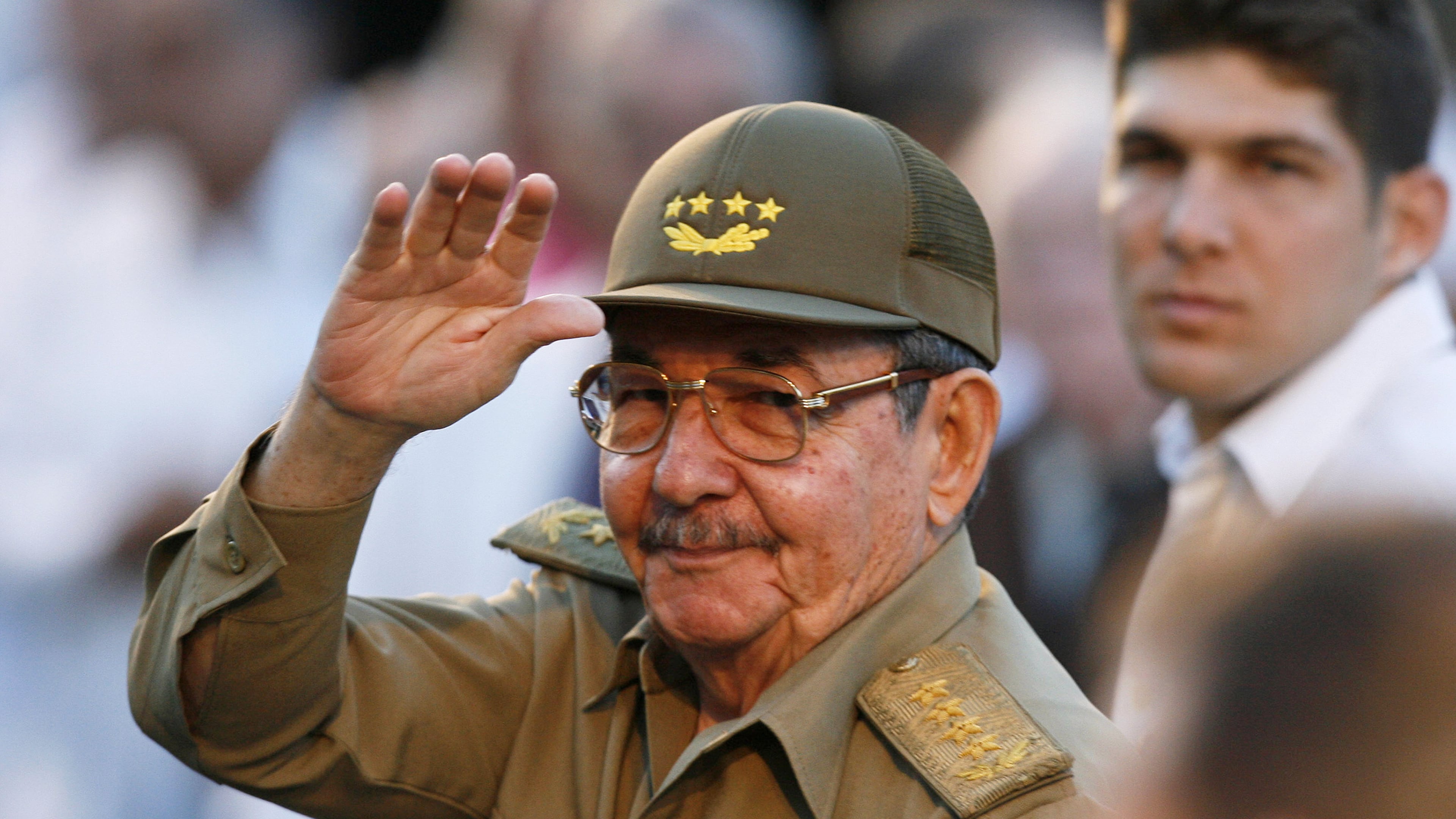 FILE - Cuba's acting President Raul Castro waves to journalists in front the Museum of the Revolution in Havana on March 13, 2007. (AP Photo/Javier Galeano, File)