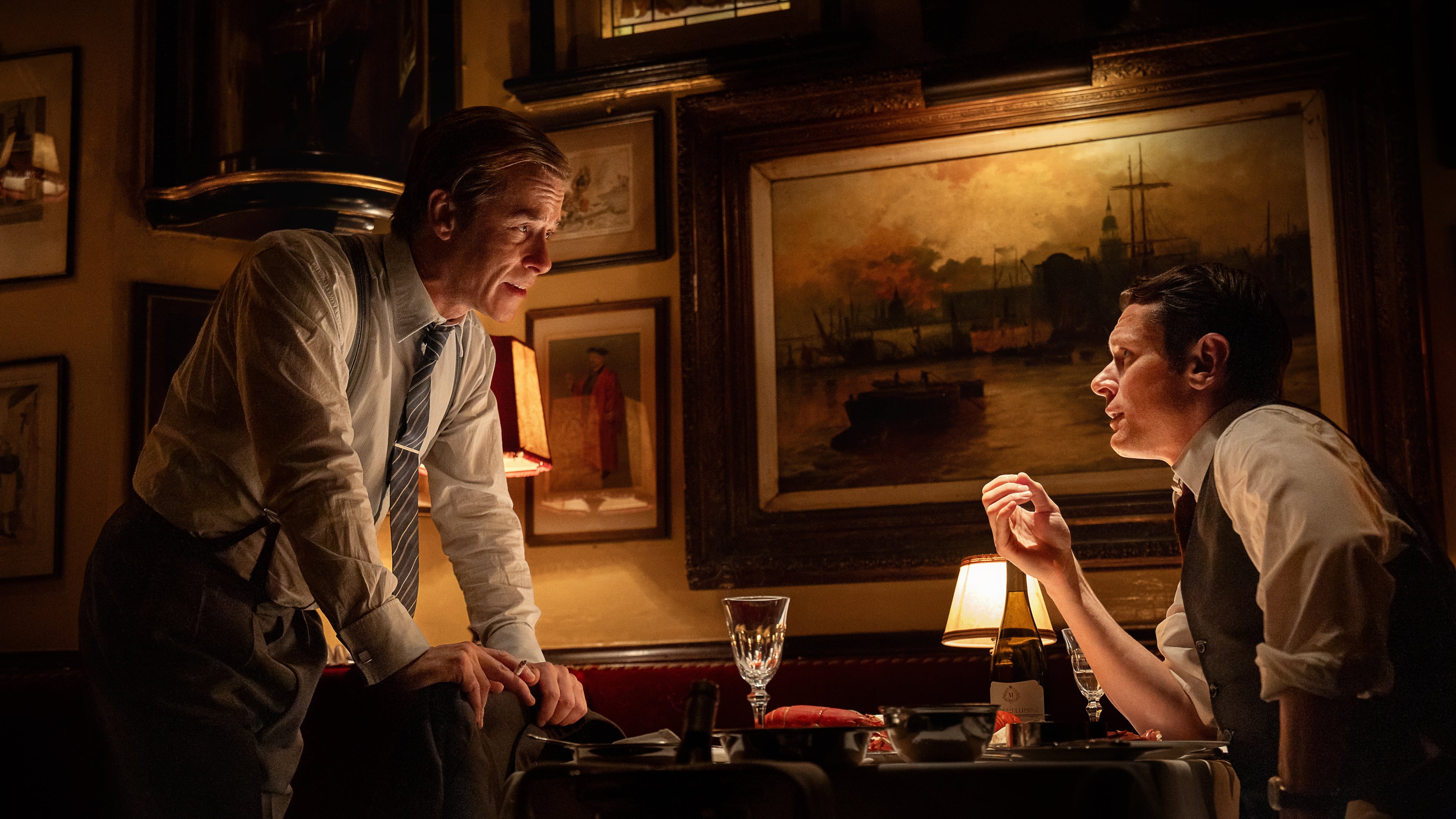 This image released by Netflix shows Guy Pearce as Rupert Murdoch, left, and Jack O'Connell as Larry Lamb, in a scene from "Ink."(Anthony Dickenson/Netflix via AP)