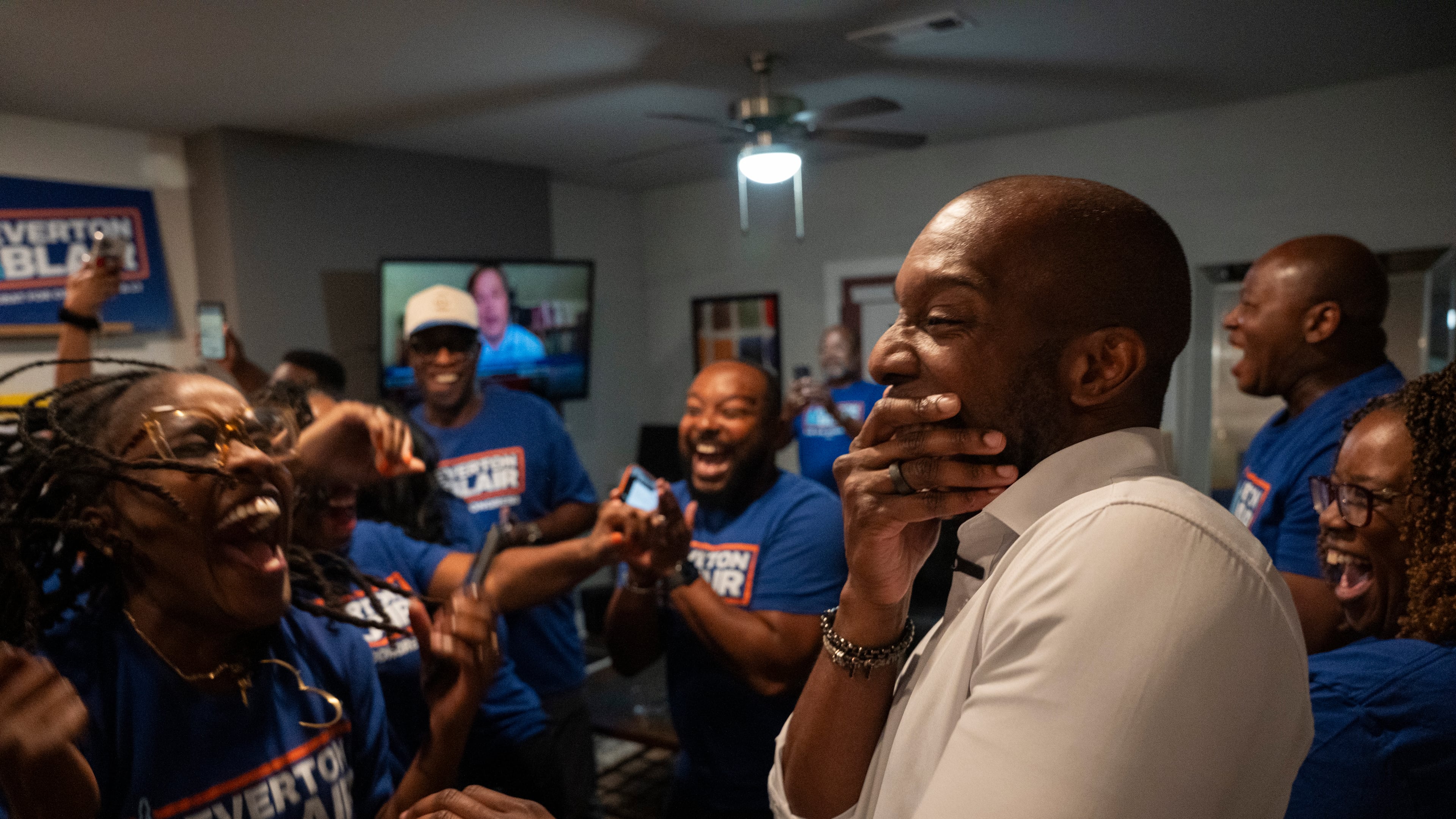 Adia Bryant (left) and former Gwinnett County Board of Education Chairman Everton Blair celebrate after Blair won the special election runoff for Georgia’s 13th Congressional District on Aug. 25, 2026. (Olivia Bowdoin for the AJC)