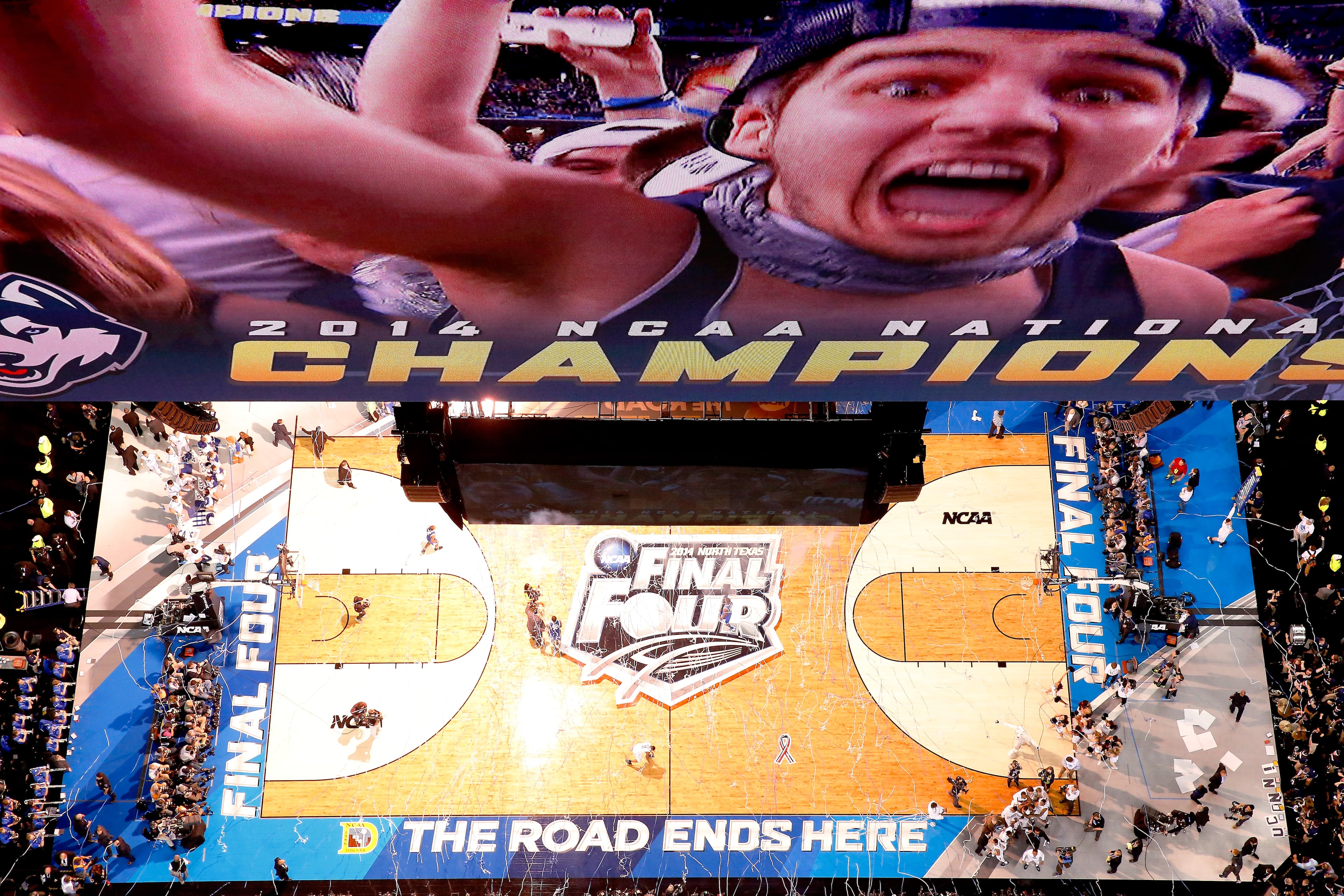 ARLINGTON, TX - APRIL 07: The Connecticut Huskies celebrate after defeating the Kentucky Wildcats 60-54 in the NCAA Men's Final Four Championship at AT&T Stadium on April 7, 2014 in Arlington, Texas. (Photo by Tom Pennington/Getty Images)