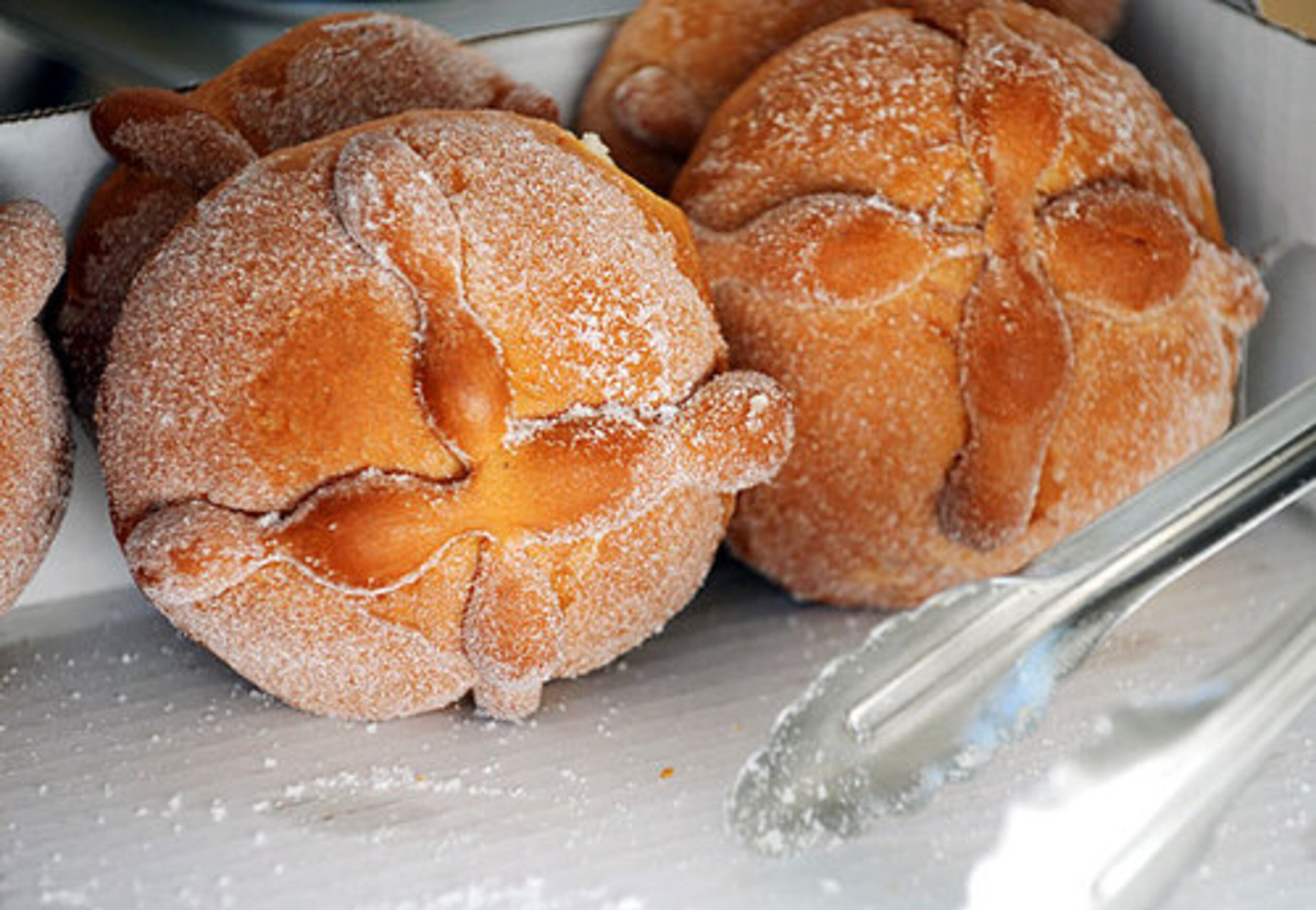 Day of the Dead bread, shaped as a cross with bones, is made from flour and sugar. Francisco Duran and his son Manuel of Alpharetta, brought the pastries to help people learn Mexican traditions.