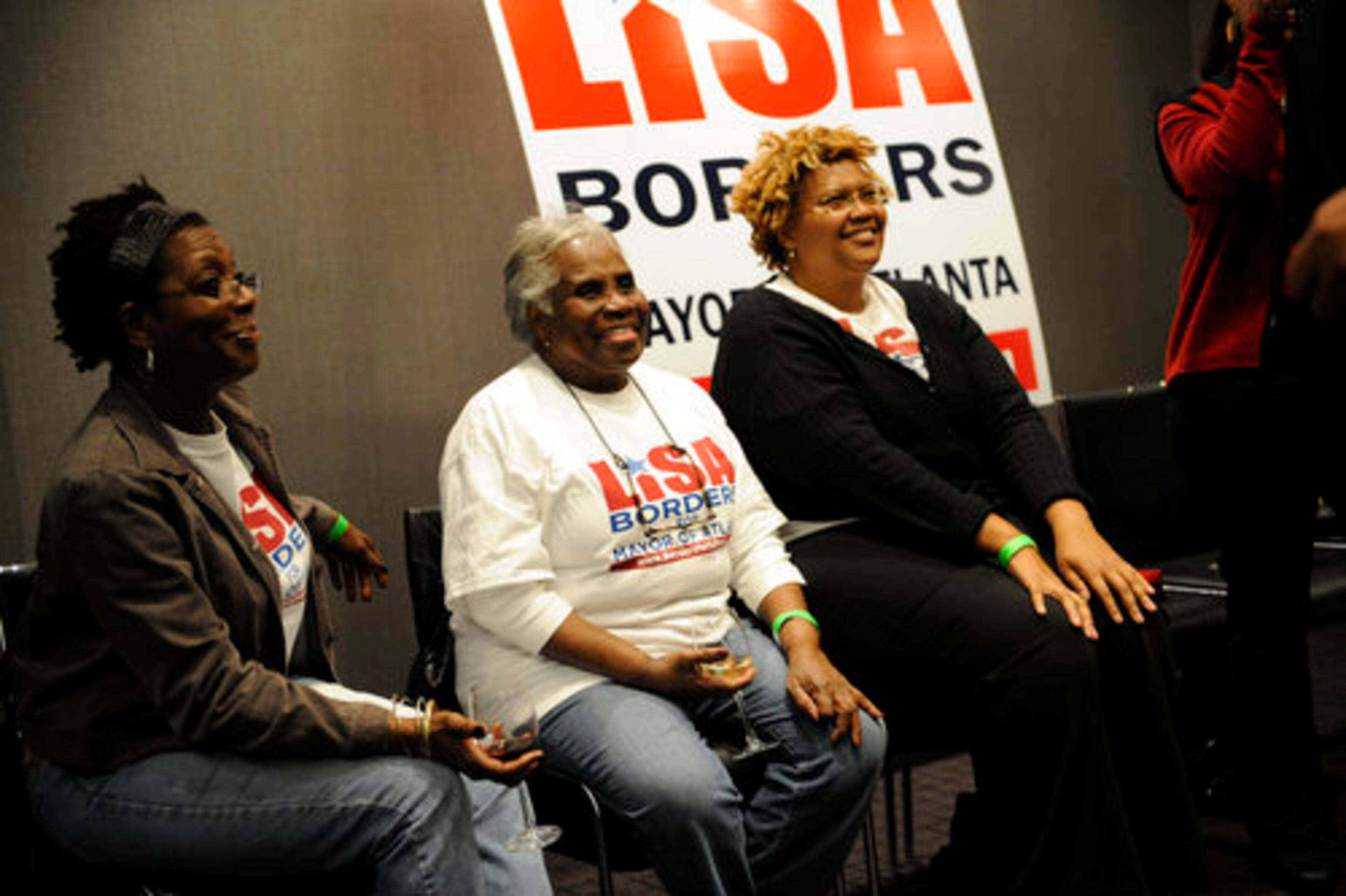 From left, supporters Mona Powell, Florence Bowser and Rhonda Johnson anxiously await a Borders appearance.