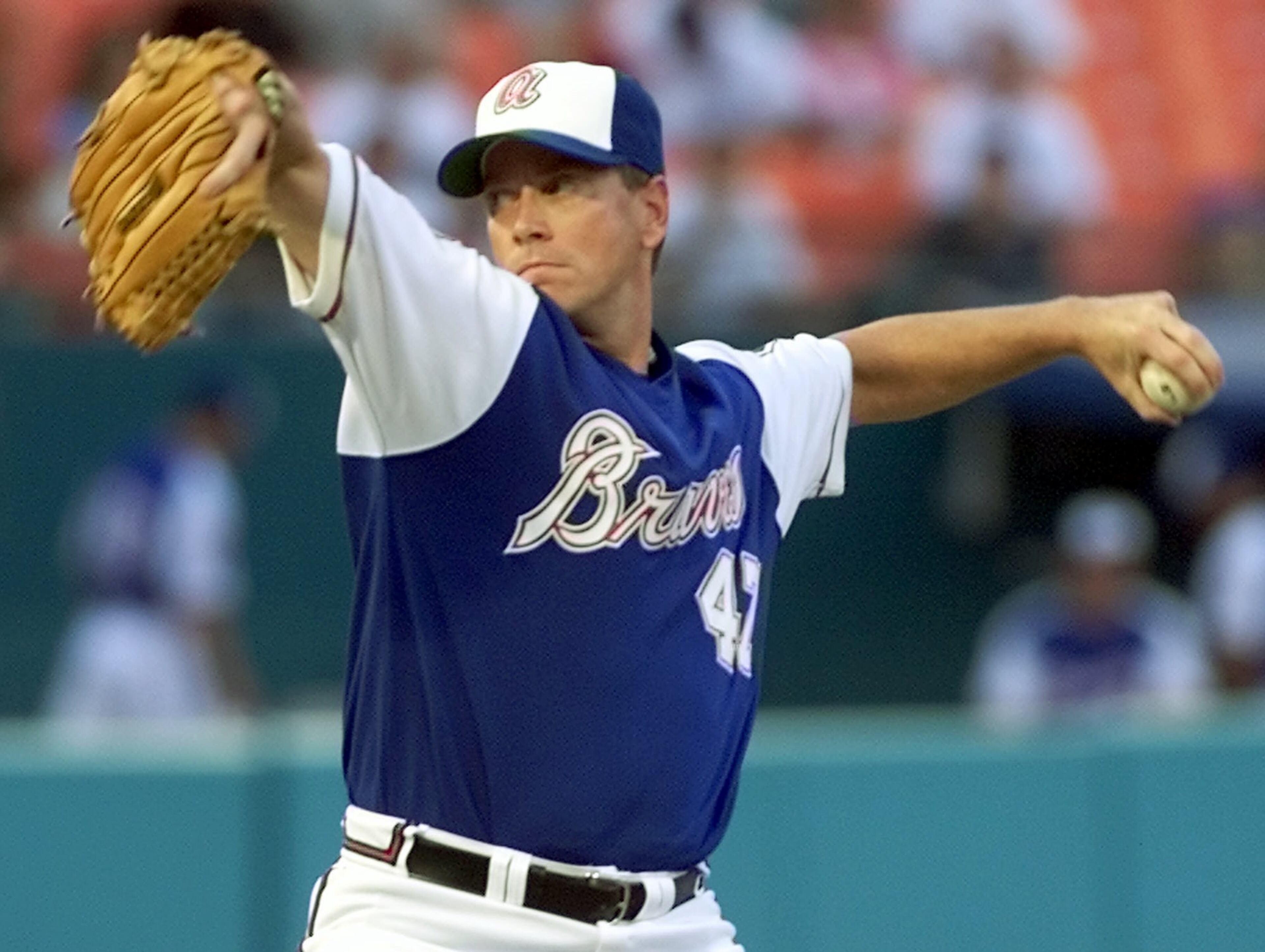 Braves pitcher Tom Glavine wears a throwback uniform in 2002.