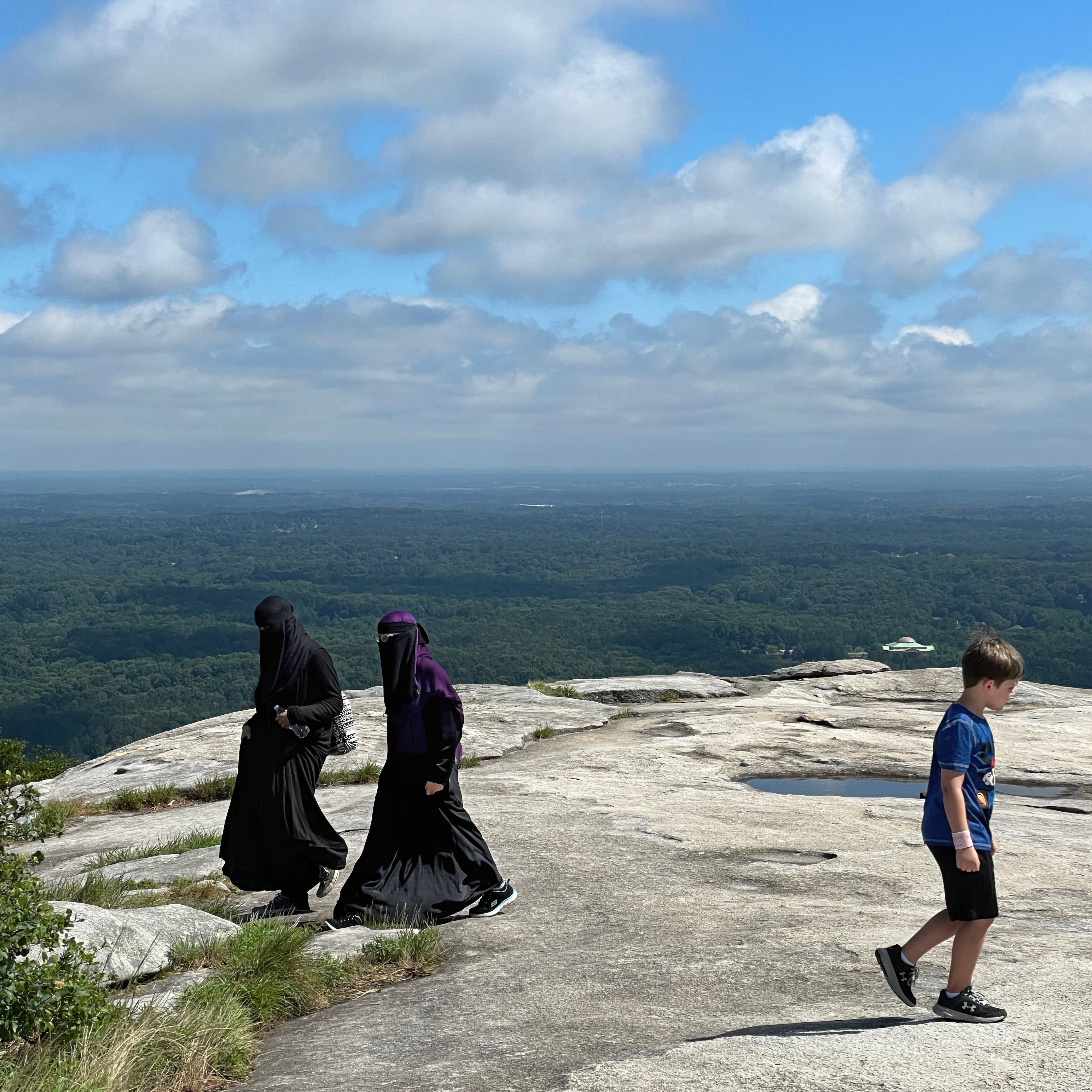 Muslim women wearing niqab veils are frequently spotted on top of Stone Mountain. (Courtesy of Jean Shifrin)