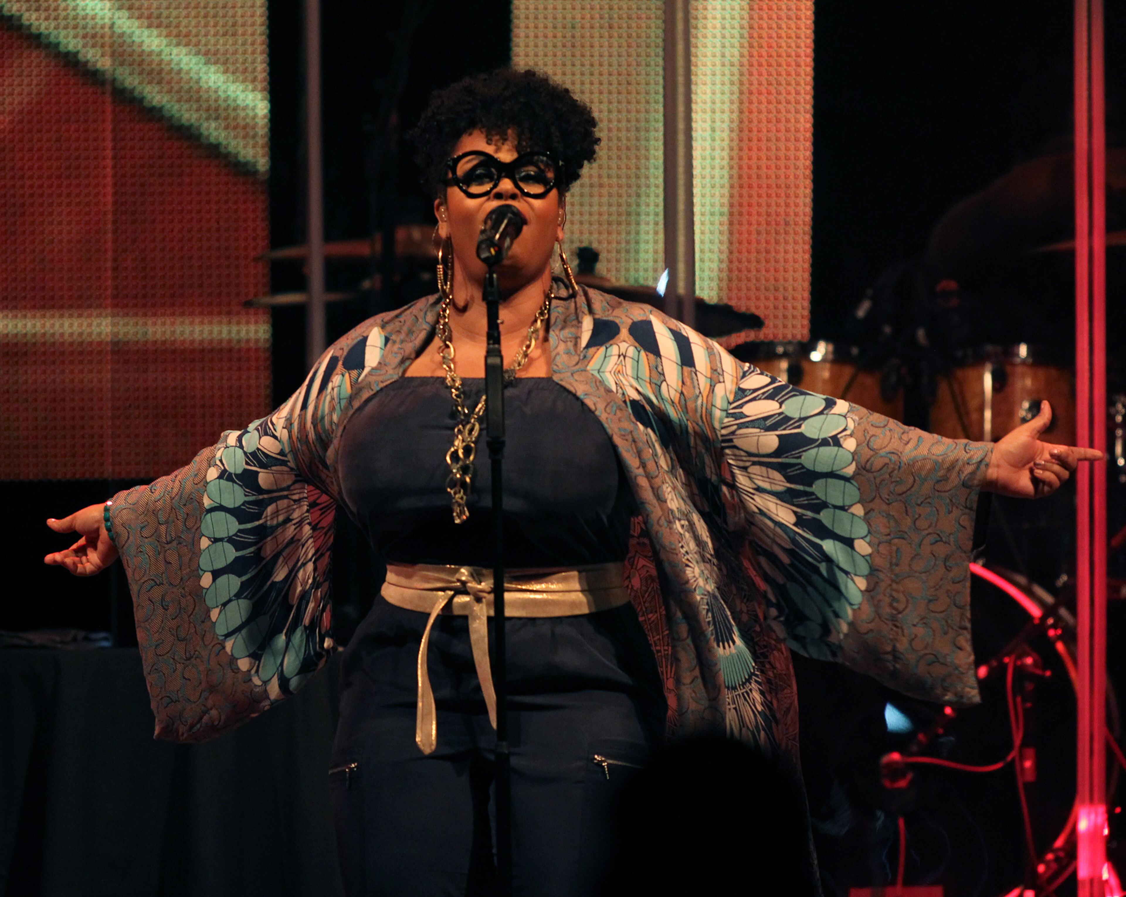 Singer/songwriter Jill Scott, a three-time Grammy Award winner, performed at Chastain Park Amphitheatre in Atlanta Sunday, Aug. 2, 2015. This year, Scott celebrates the release of her fifth studio album, "Woman," and the 15th anniversary of her multi-platinum selling debut album, "Who is Jill Scott." (Akili-Casundria Ramsess/Special to the AJC)