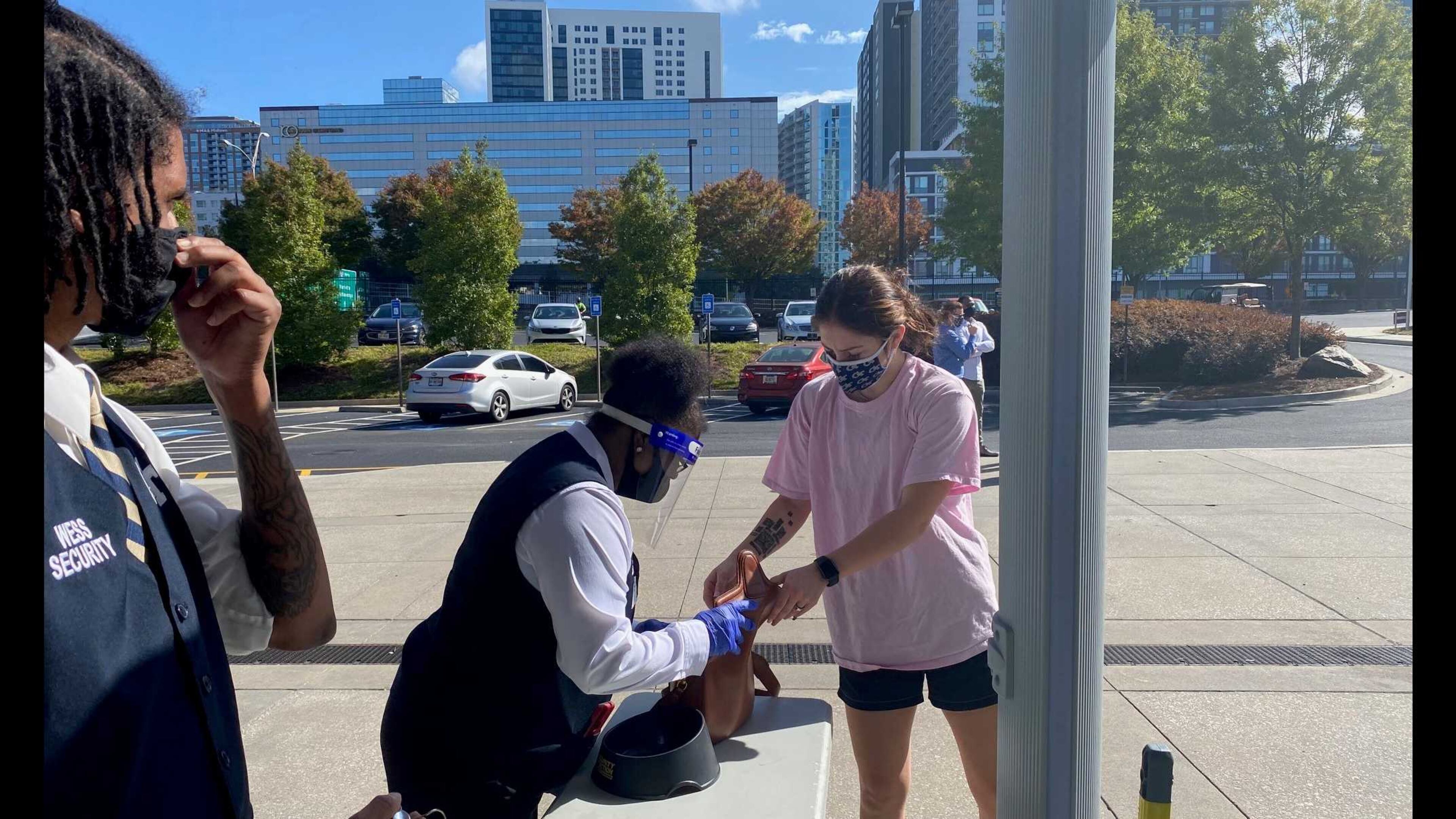Georgia Tech student Sarah Bates, 22, on the right, who is also a member of the basketball team, arrives at McCamish Pavilion on Oct. 21, 2020, for the first day of early voting at the school. More than 100 people cast ballots by midday. (ERIC STIRGUS / ESTIRGUS@AJC.COM._