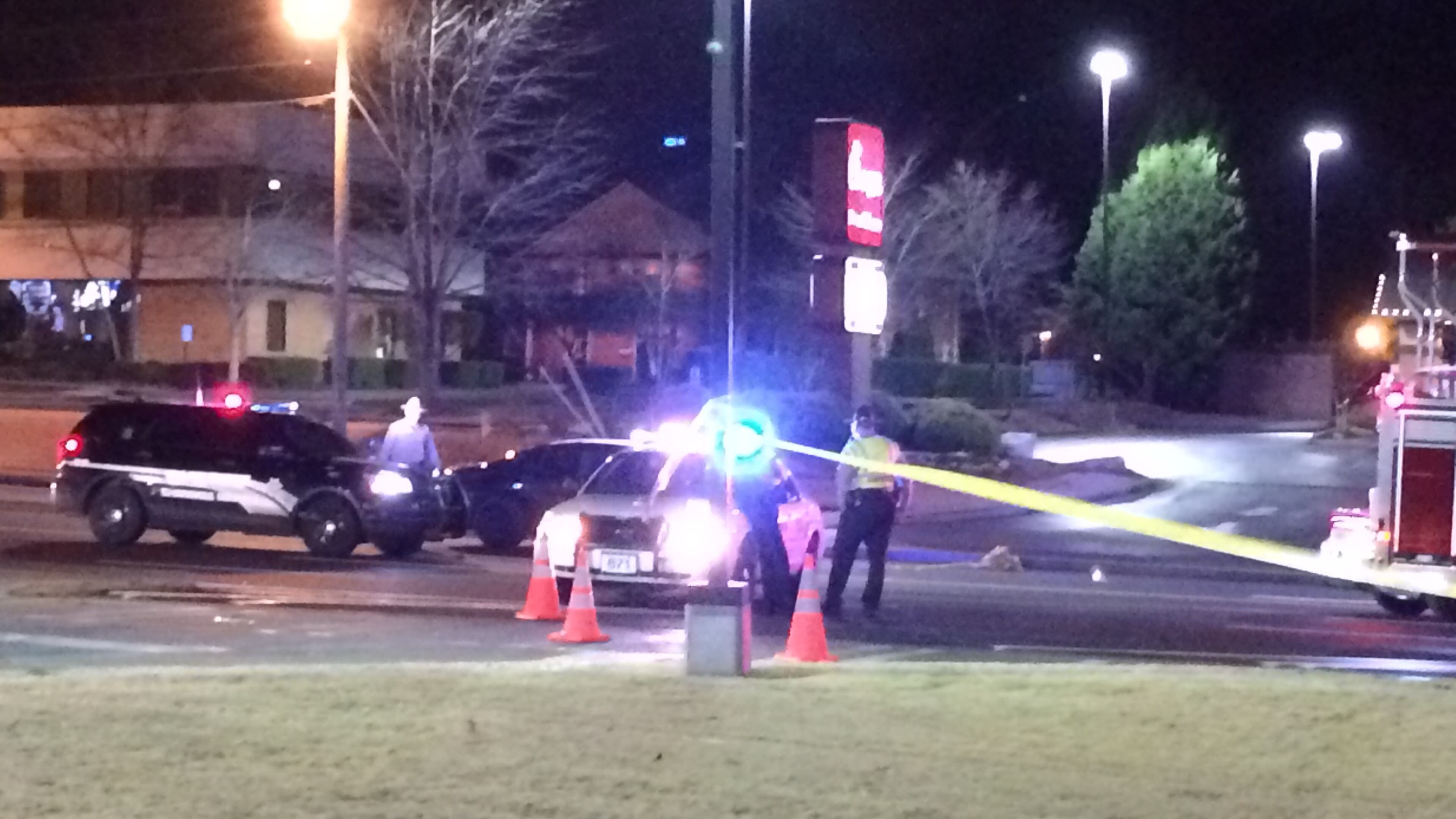 A person was shot and killed about 9:30 p.m. Tuesday on Highway 92 in Woodstock. Police have the suspect in custody. ELLEN ELDRIDGE / ELLENELDRIDGE@AJC.COM