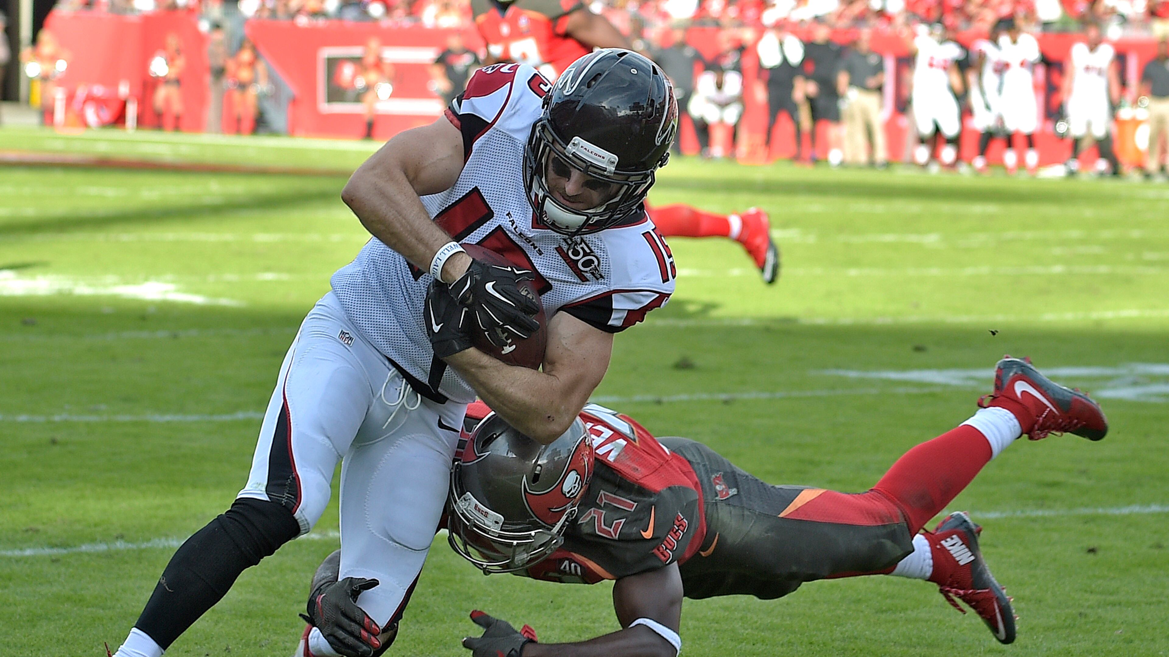Atlanta Falcons wide receiver Nick Williams eludes Tampa Bay Buccaneers cornerback Alterraun Verner (21) as he scores on a 5-yard touchdown reception during the fourth quarter of an NFL football game Sunday, Dec. 6, 2015, in Tampa, Fla. (AP Photo/Phelan M. Ebenhack)