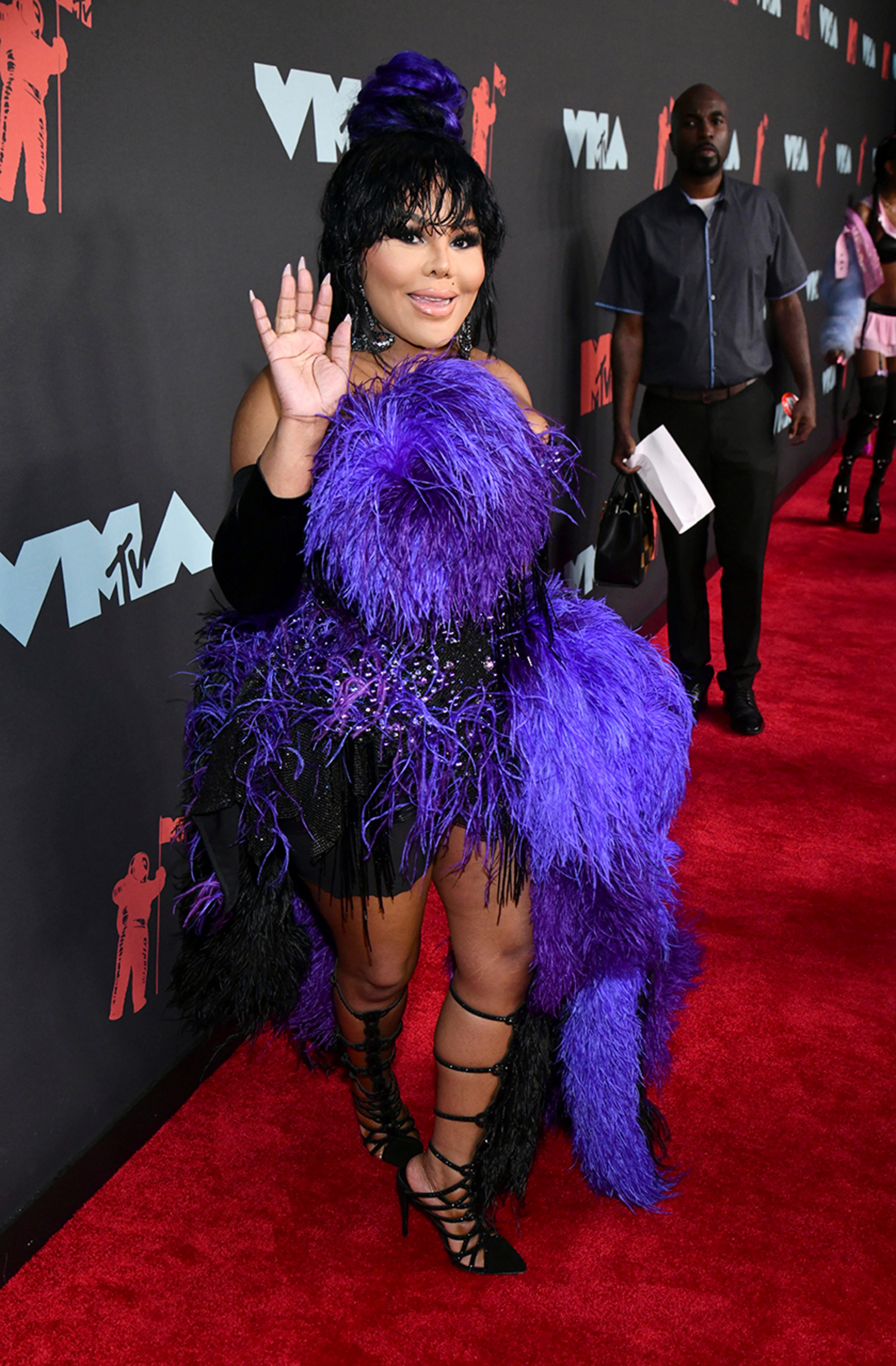 Lil' Kim arrives at the MTV Video Music Awards at the Prudential Center on Monday, Aug. 26, 2019, in Newark, N.J. (Photo by Charles Sykes/Invision/AP)