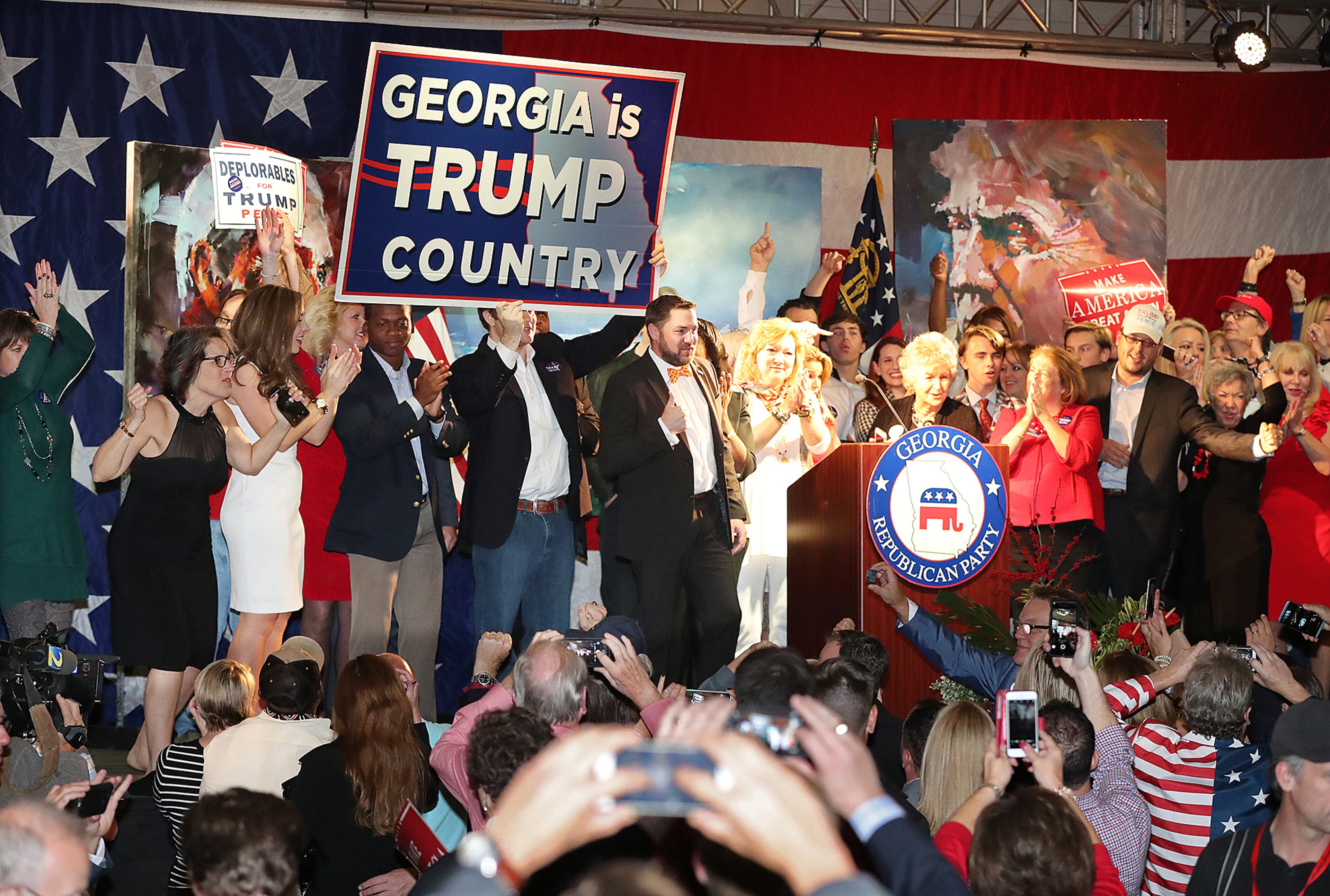 Republican voters celebrate as it is announced Trump wins Georgia at the Republican Watch party at the Grand Hyatt, Buckhead, on Tuesday, Nov. 8, 2016, in Atlanta. (Curtis Compton / ccompton@ajc.com)
