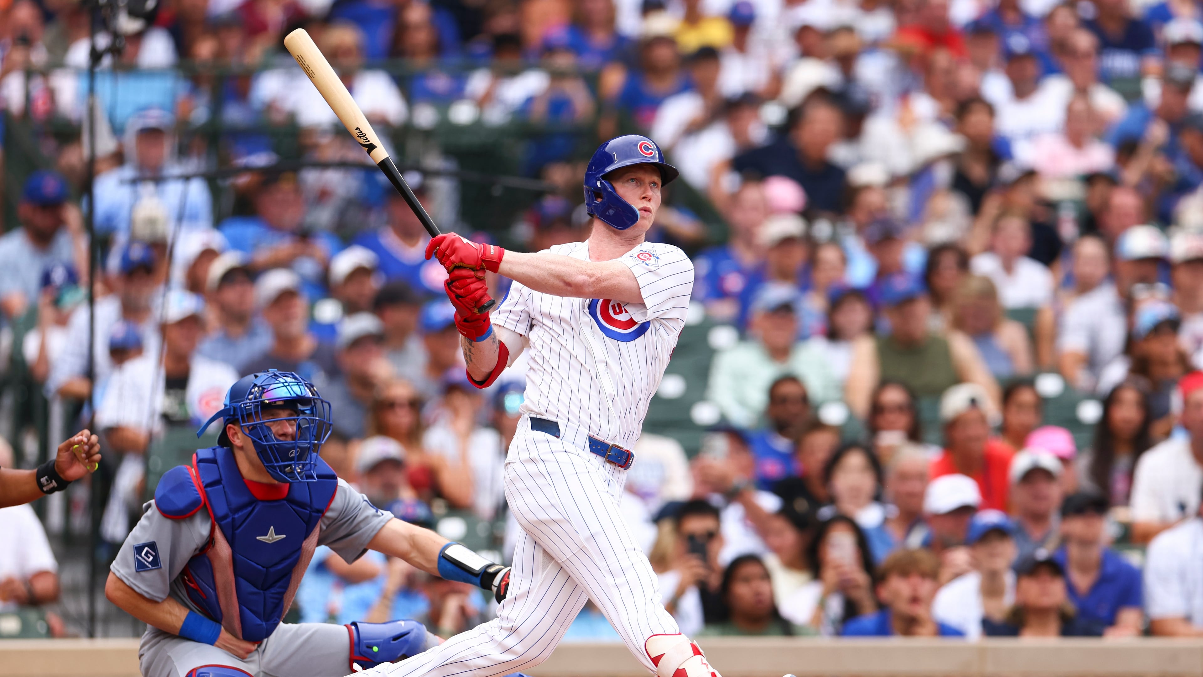 Chicago Cubs designated hitter Pete Crow-Armstrong follows through on an RBI double during the second inning of a baseball game against the Los Angeles Dodgers in Chicago, Wednesday, Aug. 5, 2026. (AP Photo/Jessie Alcheh)