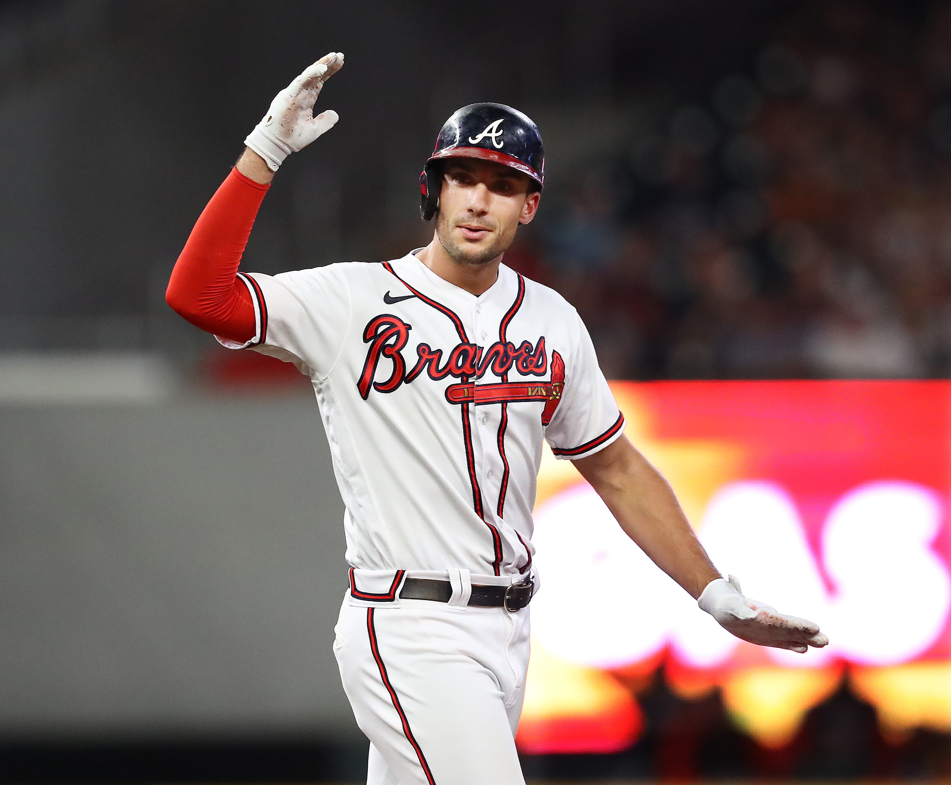 Braves first baseman Matt Olson celebrates after he hit a double against the Nationals during the fourth inning Monday night at Truist Park. (Curtis Compton / Curtis Compton@ajc.com)