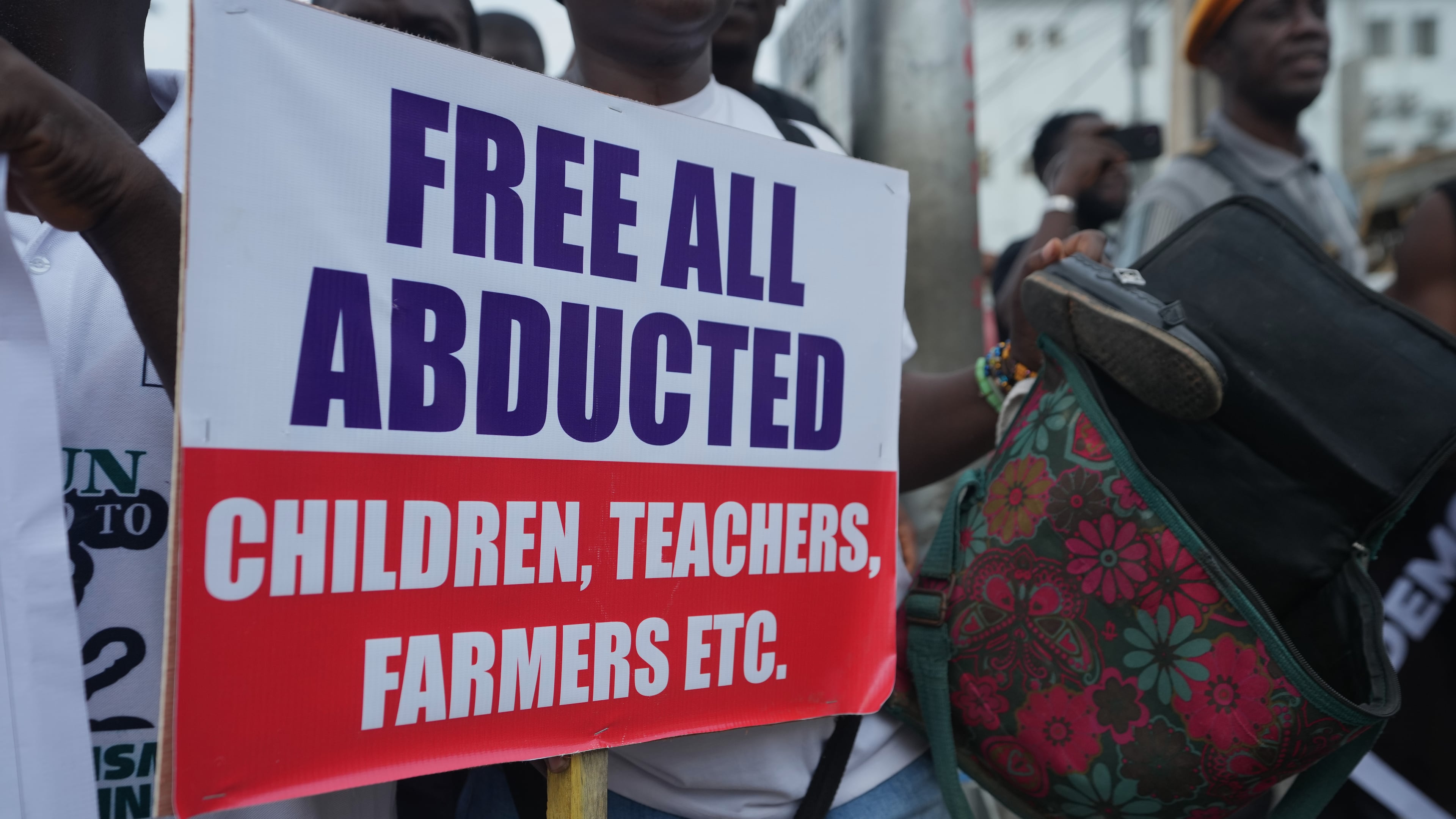FILE - People protest demanding government to rescue the school children that were recently kidnapped in various part of the country, on the street of Lagos, Nigeria, Friday, June 12, 2026. (AP Photo/Sunday Alamba, File)