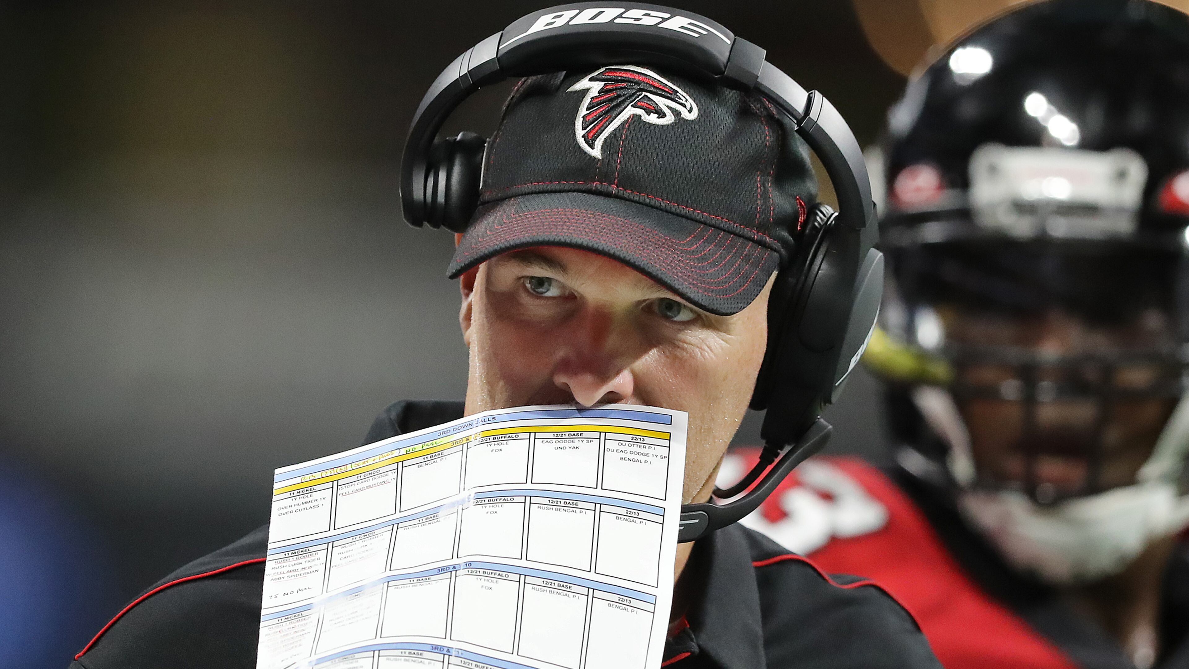 Falcons head coach Dan Quinn calls a defense against the Washington Redskins. Curtis Compton/ccompton@ajc.com