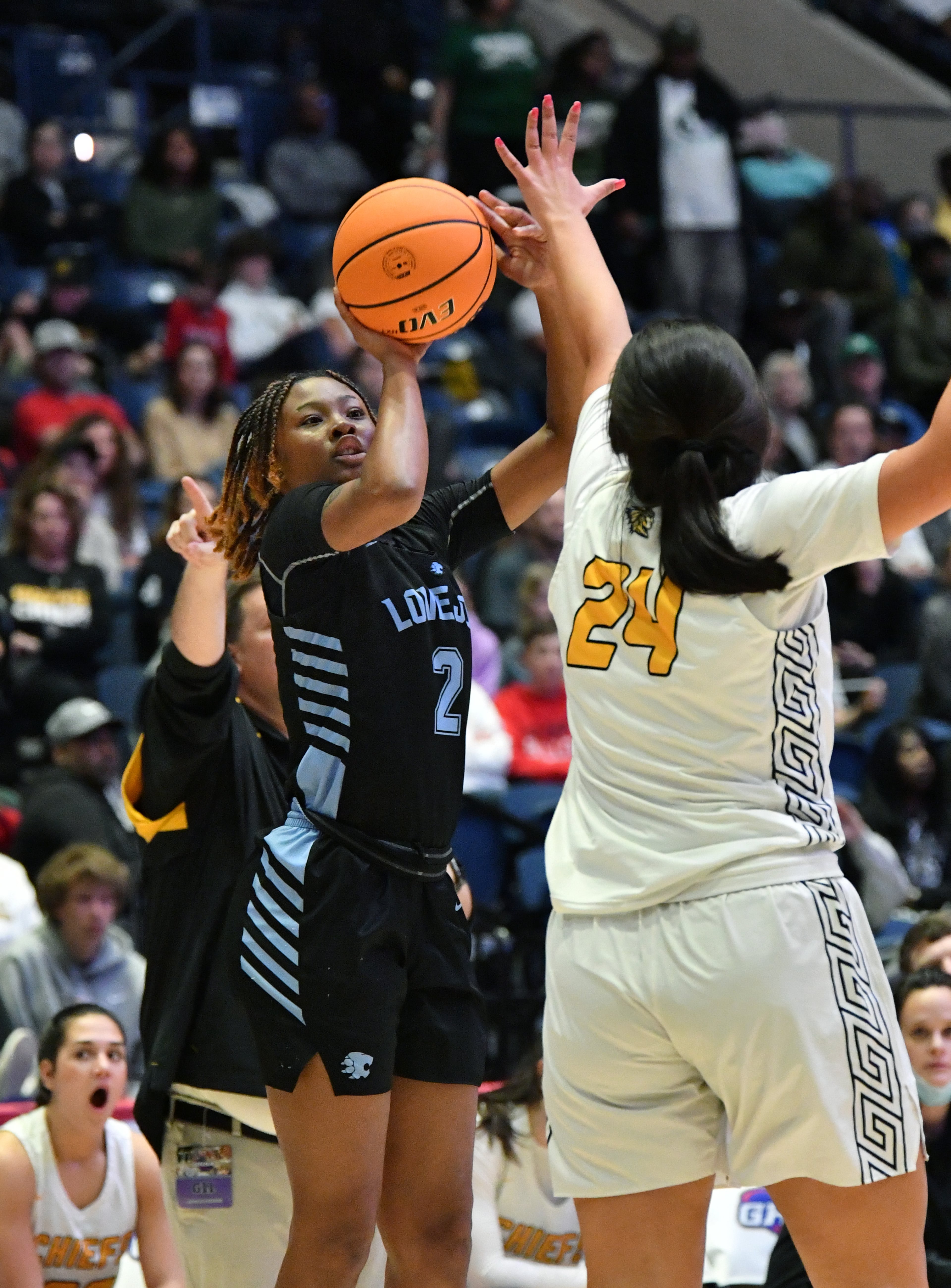 March 11, 2022 Macon - Lovejoy's Keyra Peterson (2) shoots against Sequoyah's Amy Singh (24) during the 2022 GHSA State Basketball Class AAAAAA Girls Championship game at the Macon Centreplex in Macon on Friday, March 11, 2022. (Hyosub Shin / Hyosub.Shin@ajc.com)