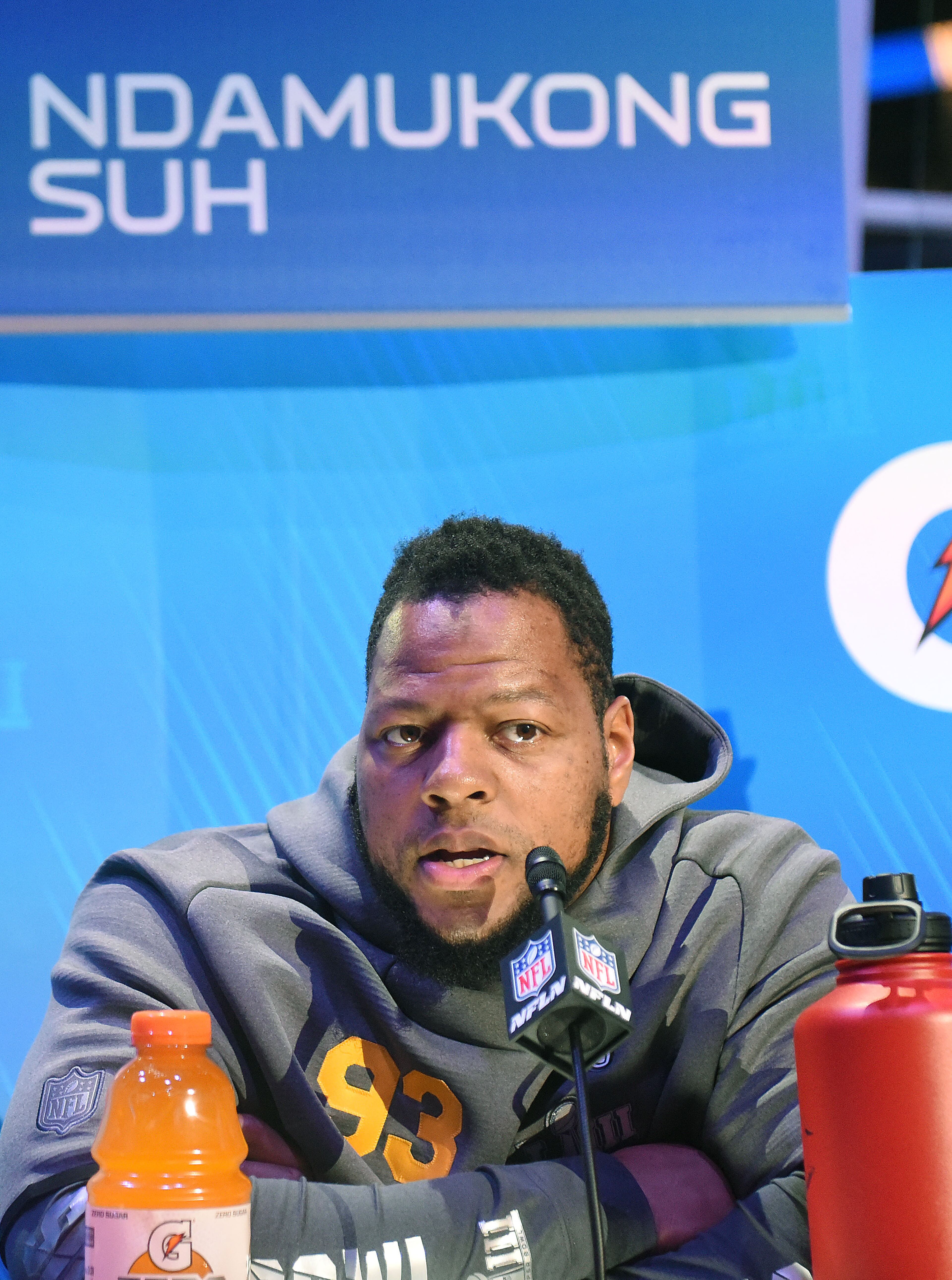 Ndamukong Suh addresses the media gathering during Monday's event. (Ryon Horne/rhorne@ajc.com)