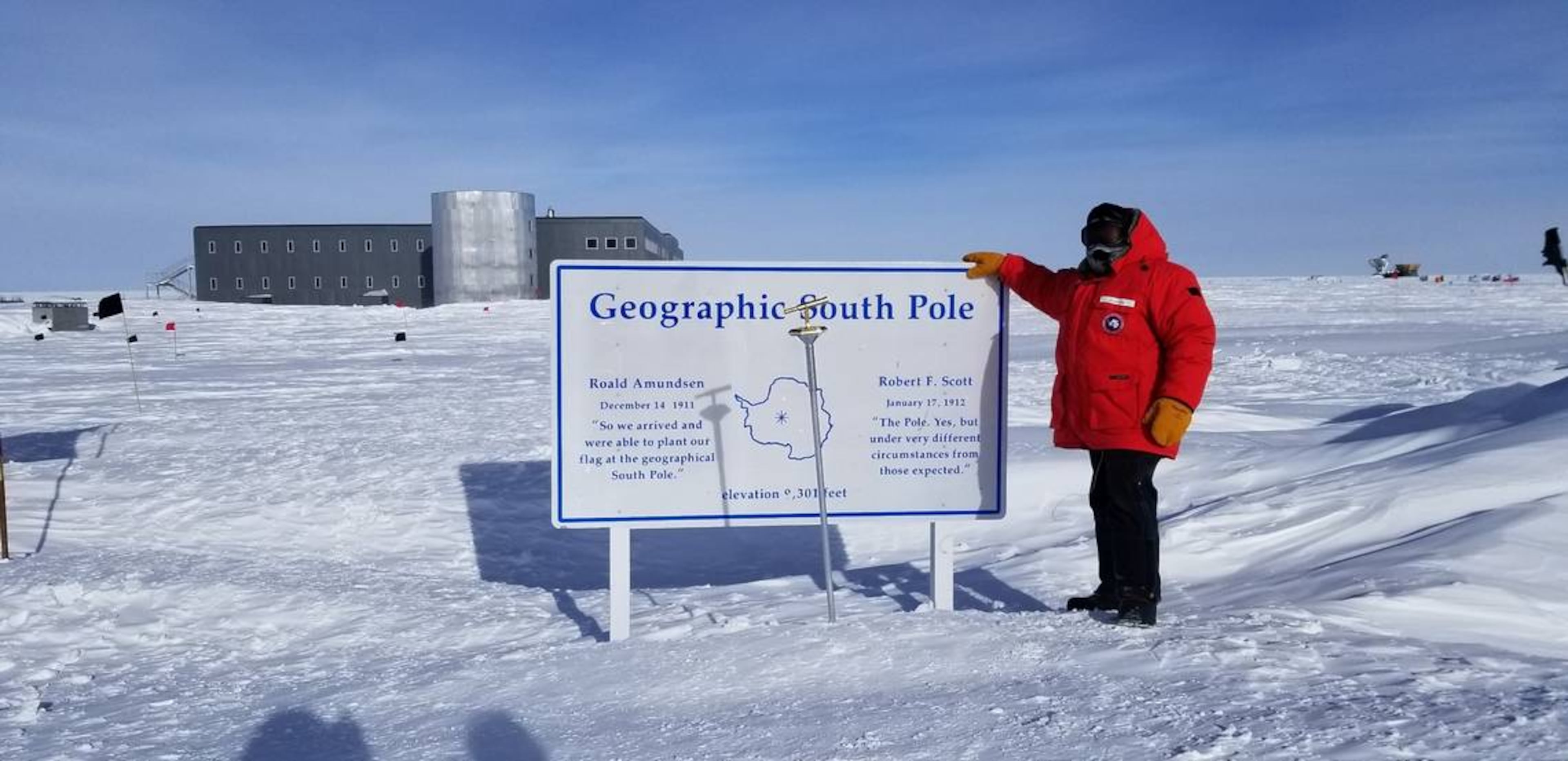 John Hood, a 2006 graduate of Carver High School and a 2014 graduate of Columbus State University, stands at the geographic South Pole while working for a month in 2019 on the South Pole Telescope. (Photo provided by John Hood)