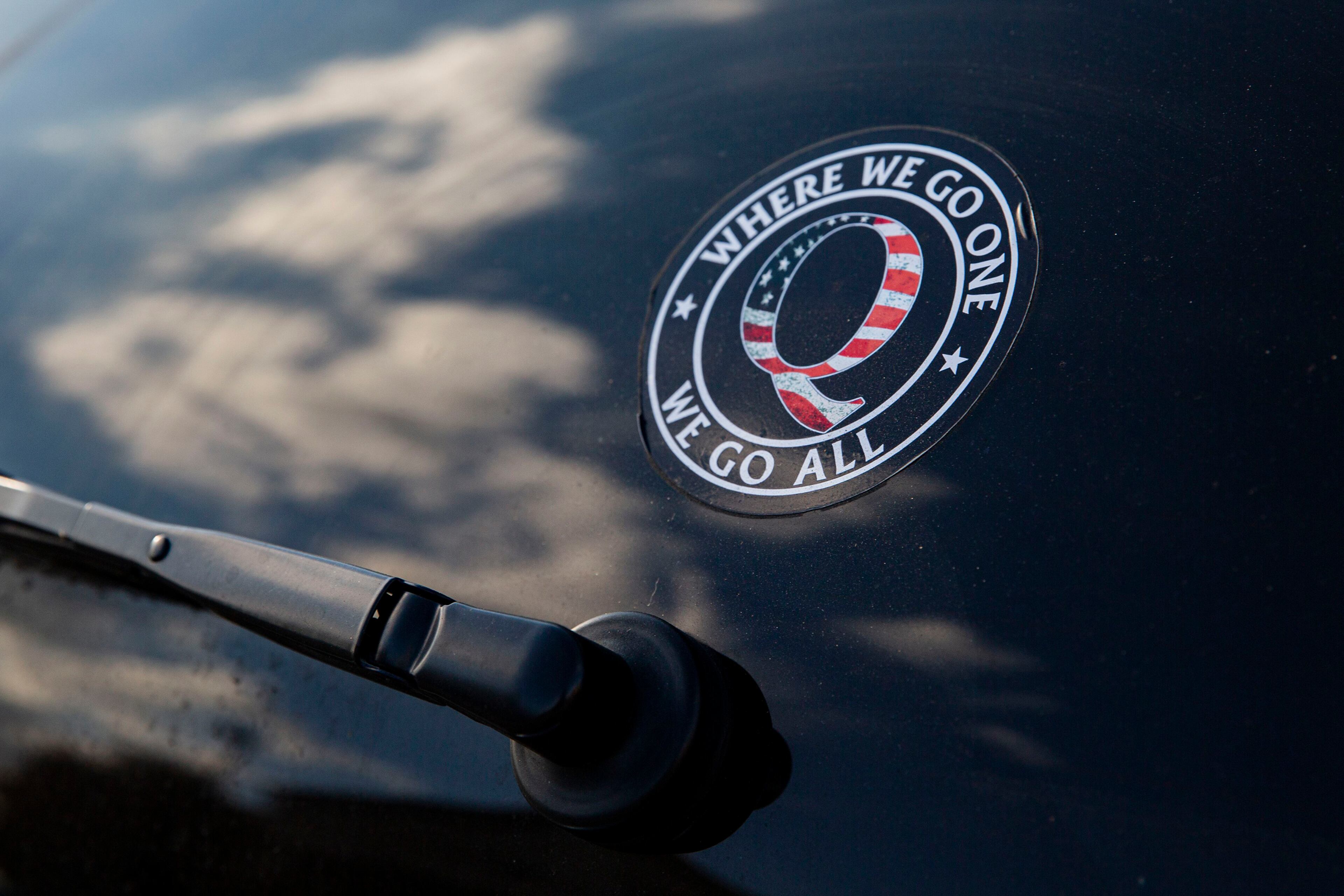 There are several reasons for dwindling Q talk — Donald Trump losing the presidential election, for instance, and the lack of new messages from “Q.” But the single-biggest factor appears to have been the QAnon crackdown on Facebook and Twitter. (Juan Figueroa/The Dallas Morning News/TNS)