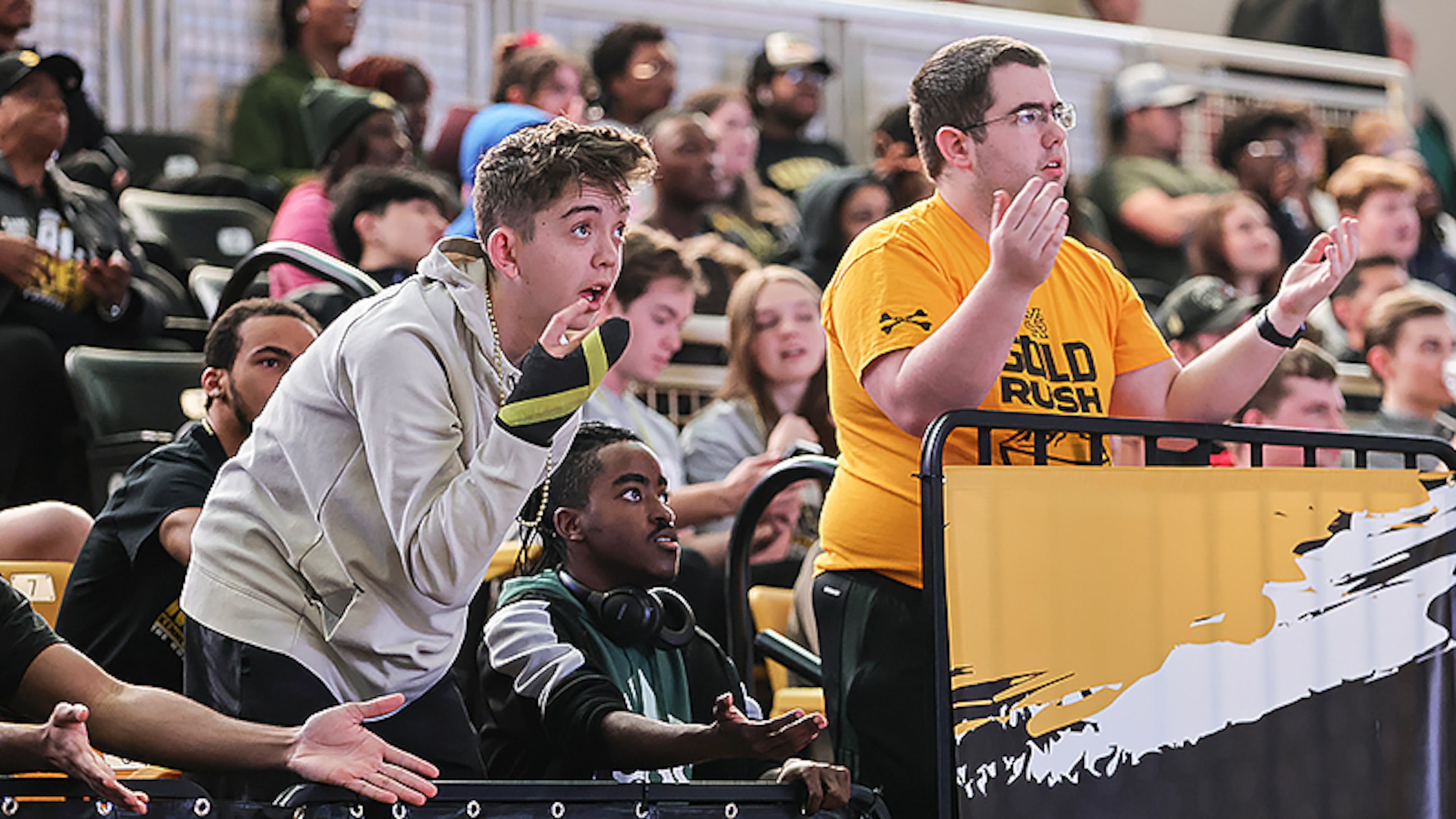 Kennesaw State students react during a watch party at KSU convocation Center as the men’s basketball team appears in their first NCAA tournament on Friday, March 17, 2023. (Natrice Miller/ natrice.miller@ajc.com)