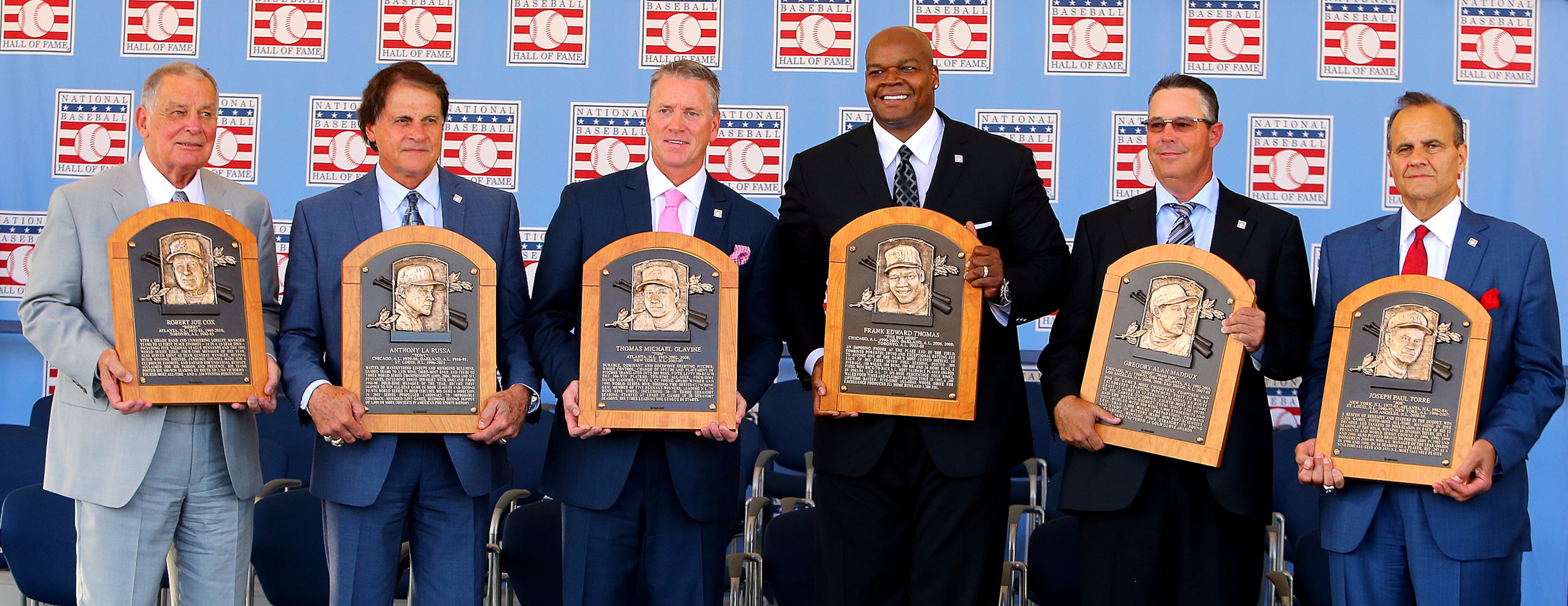 Bobby Cox (from left), Tony La Russa, Tom Glavine, Frank Thomas, Greg Maddux, and Joe Torre hold their hardware at the conclusion of the National Baseball Hall of Fame Induction Ceremony. CURTIS COMPTON / CCOMPTON@AJC.COM