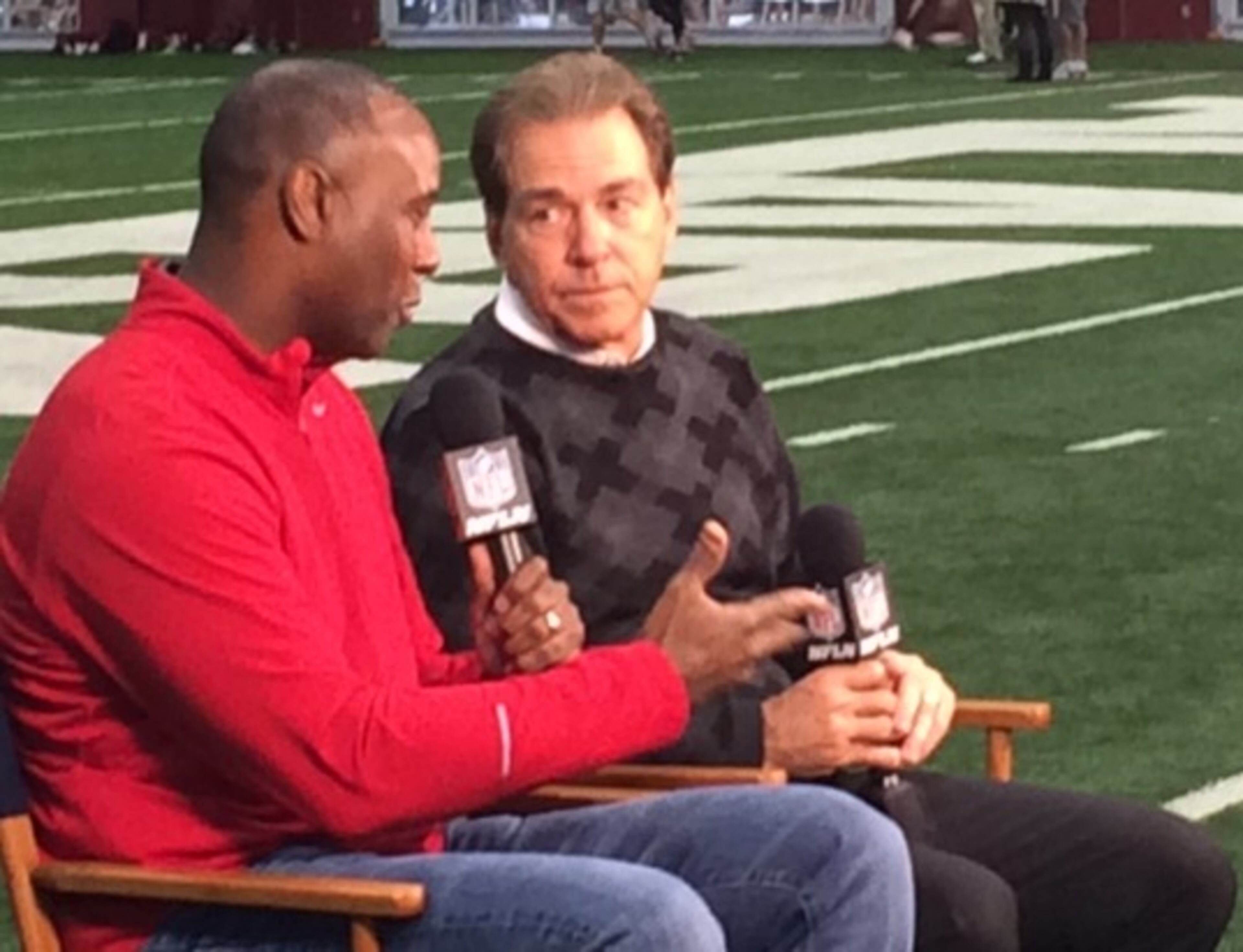 Charles Davis (left) chatting with Alabama coach Nick Saban at the school's Pro Day. (D. Orlando Ledbetter/DLedbetter@ajc.com)