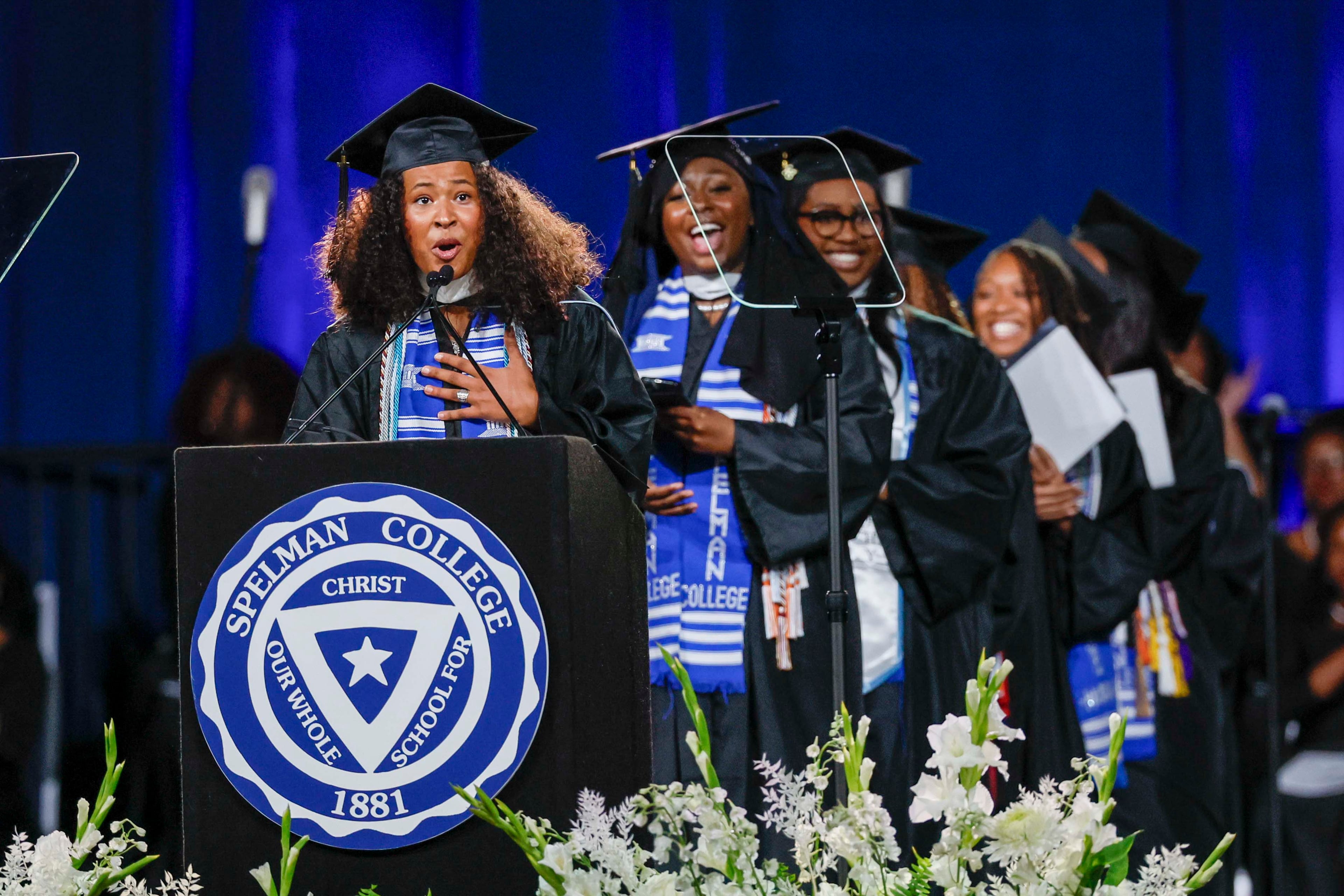 Valedictorian Sophia Michelle T. Davis delivers her speech during the Spelman College Commencement at the Georgia International Convention Center in College Park on Sunday, May 17, 2026. (Miguel Martinez/AJC)