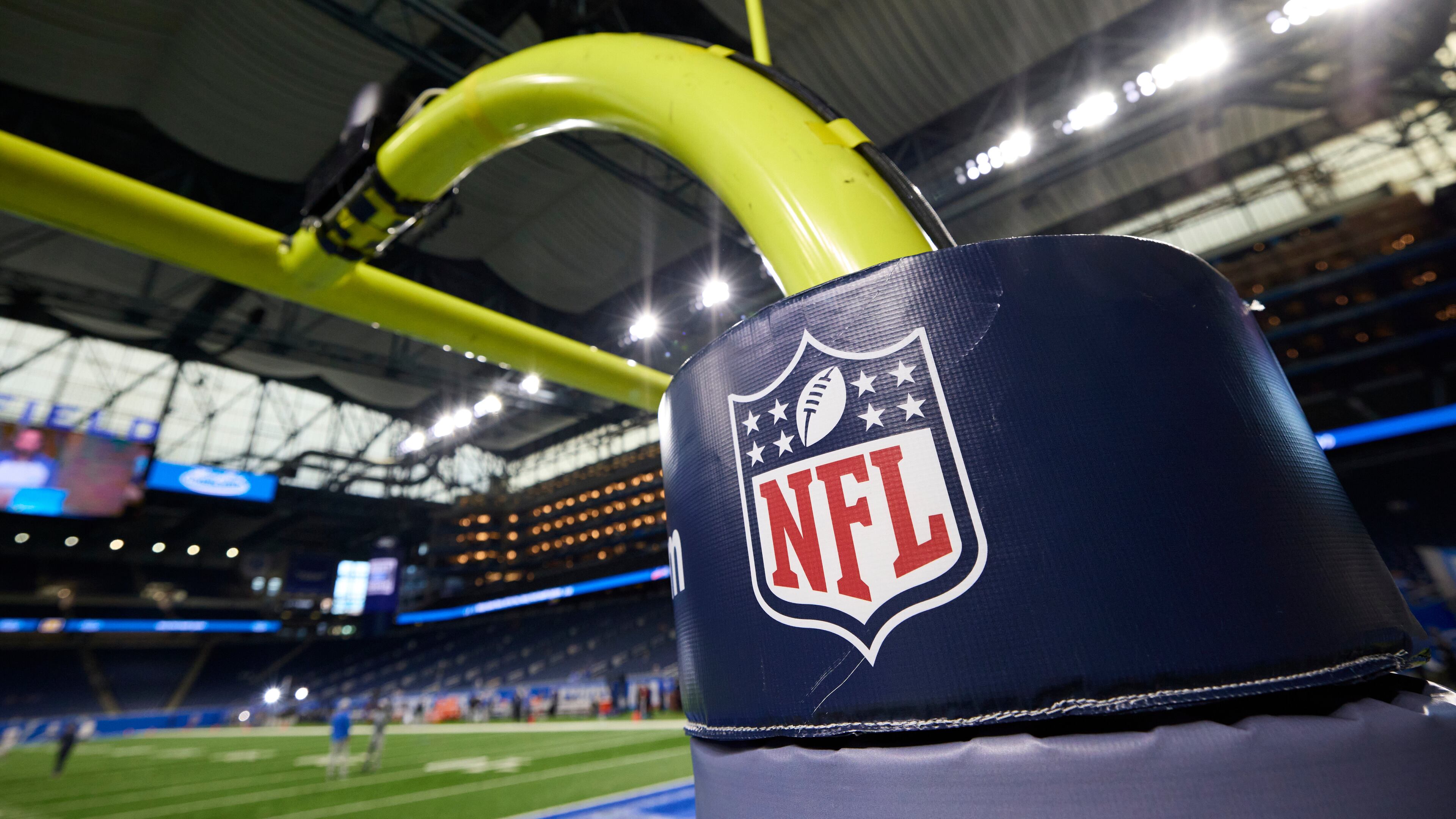 FILE - In this Aug. 13, 2021, file photo, an NFL logo is displayed on a goal post pad during an NFL preseason football game between the Buffalo Bills and Detroit Lions in Detroit. (AP Photo/Rick Osentoski, File)