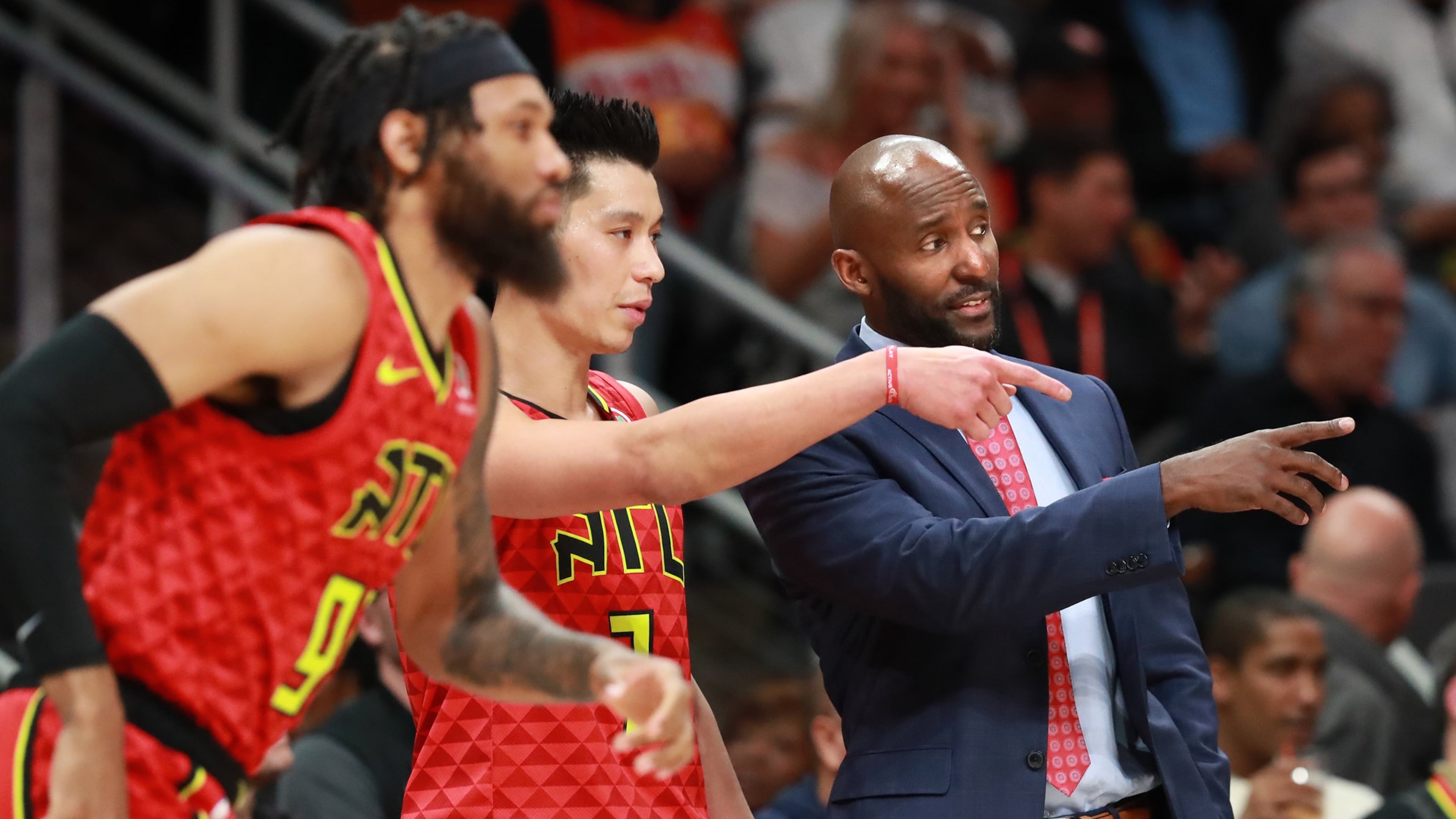 Atlanta Hawks head coach Lloyd Pierce coaches up Jeremy Lin against the Milwaukee Bucks during the second half in a NBA basketball game at State Farm Arena on Sunday, Jan. 13, 2019, in Atlanta. Curtis Compton/ccompton@ajc.com