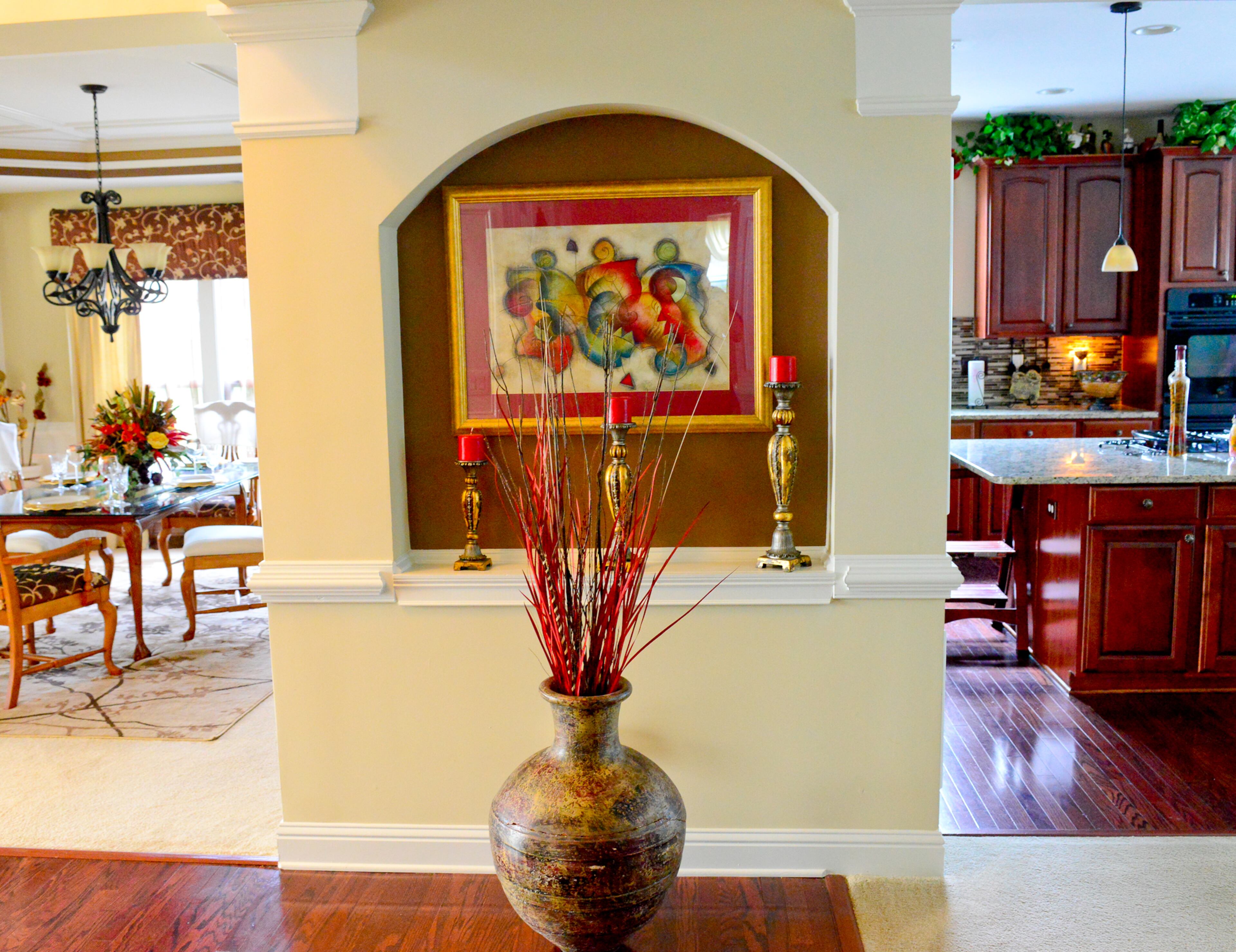 The open floor plan allows homeowners Frances and Garnell Pace to view into several rooms, but also separates the open space. The urn is from Pier 1 Imports, and they have filled their home with various kinds of artwork from stores at The Gallery at South DeKalb (formerly South DeKalb Mall) and The Mall at Stonecrest.