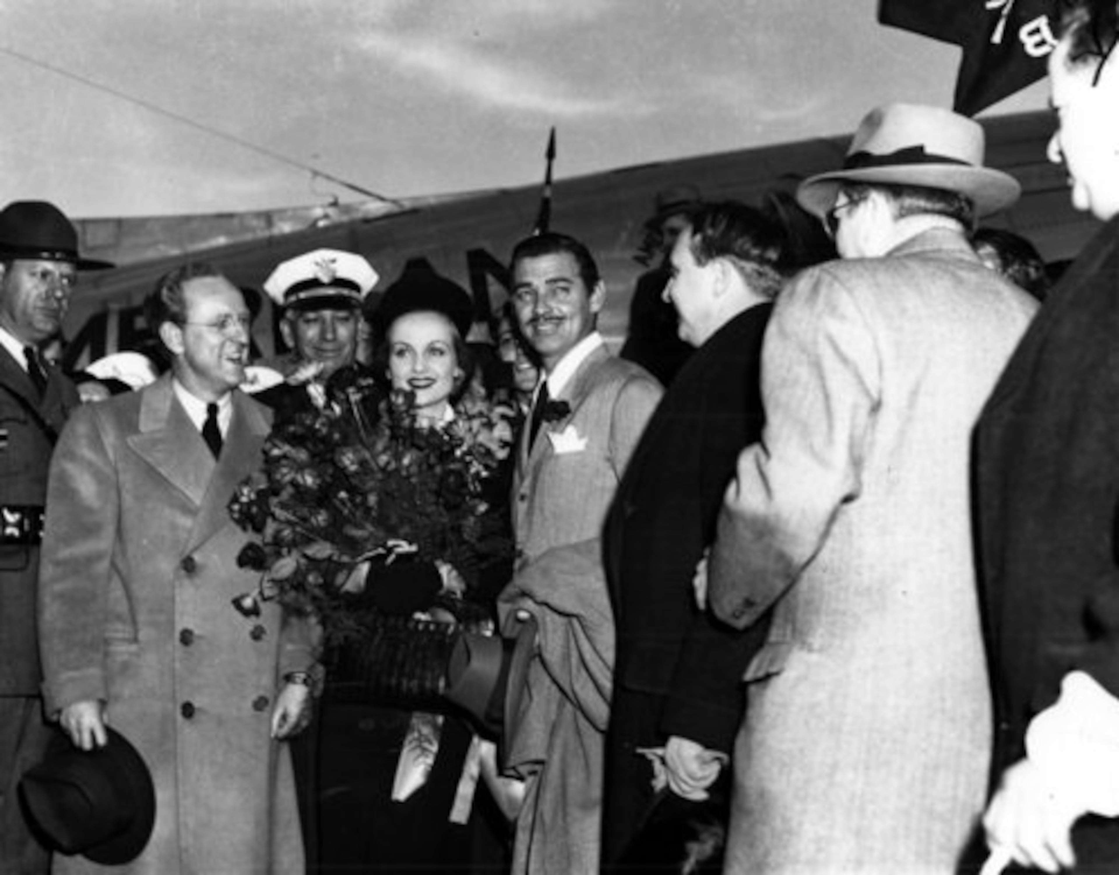 Clark Gable (Rhett Butler) and his wife, actress Carole Lombard, arrive in Atlanta.