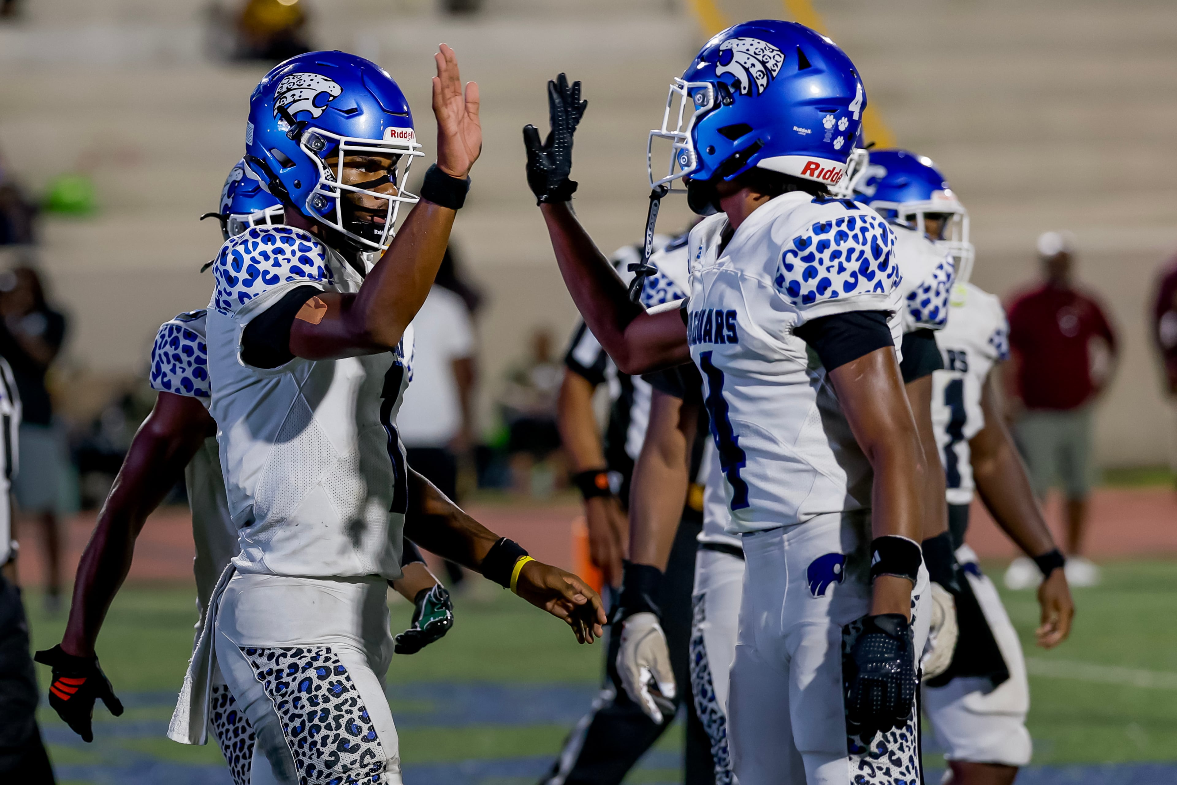 Stephenson quarterback Zabrian Boler (left) celebrates his second half touchdown against Tucker with wide receiver Micheal Miller at Hallford Stadium on Friday, Sept. 4, 2026, in Clarkston. (Erik S. Lesser for the AJC)