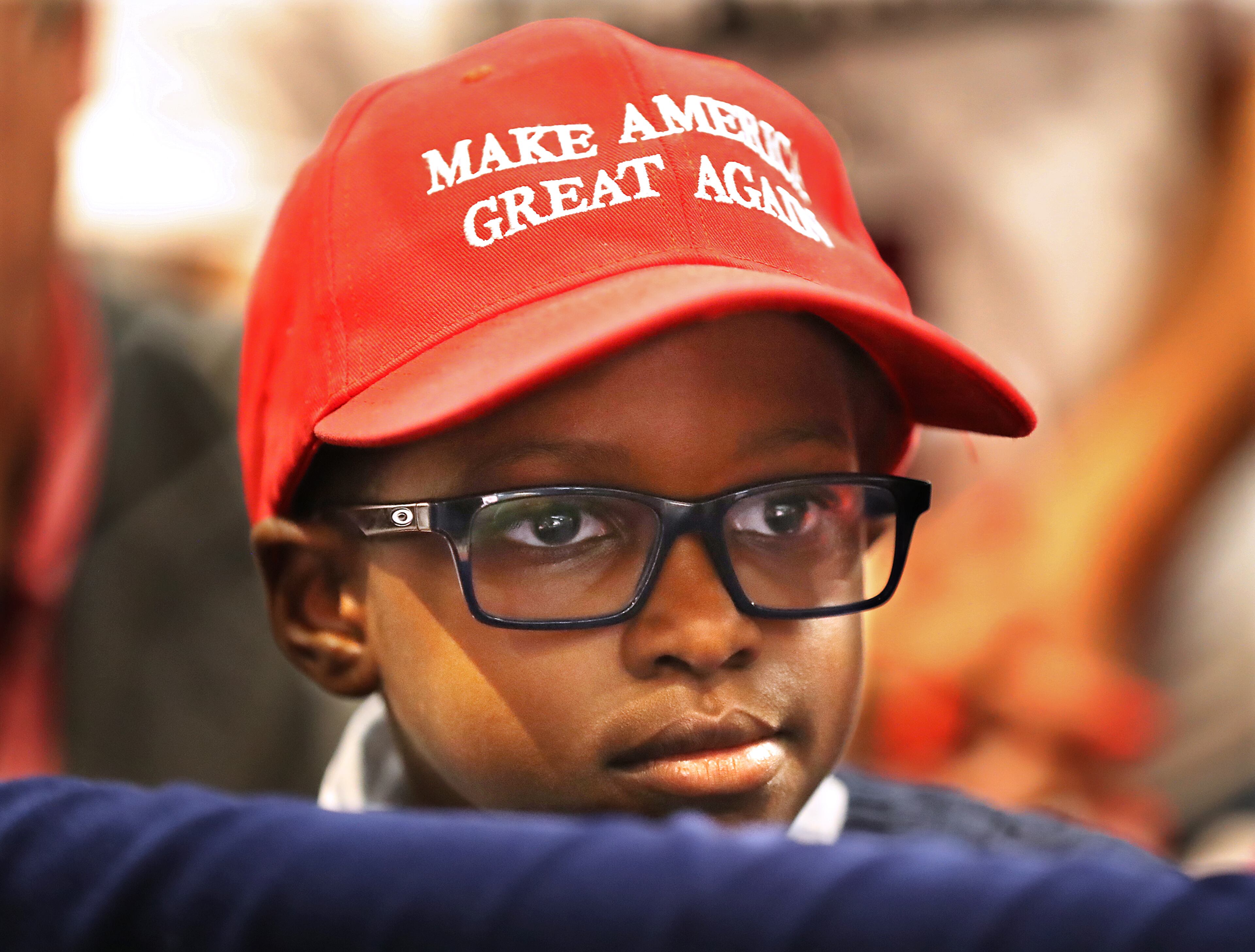 November 8, 2019 Atlanta: Eight-year-old Reagan Pete listens while President Donald Trump speaks at the Black Voices for Trump Coalition Rollout on Friday, November 8, 2019, in Atlanta. Curtis Compton/ccompton@ajc.com