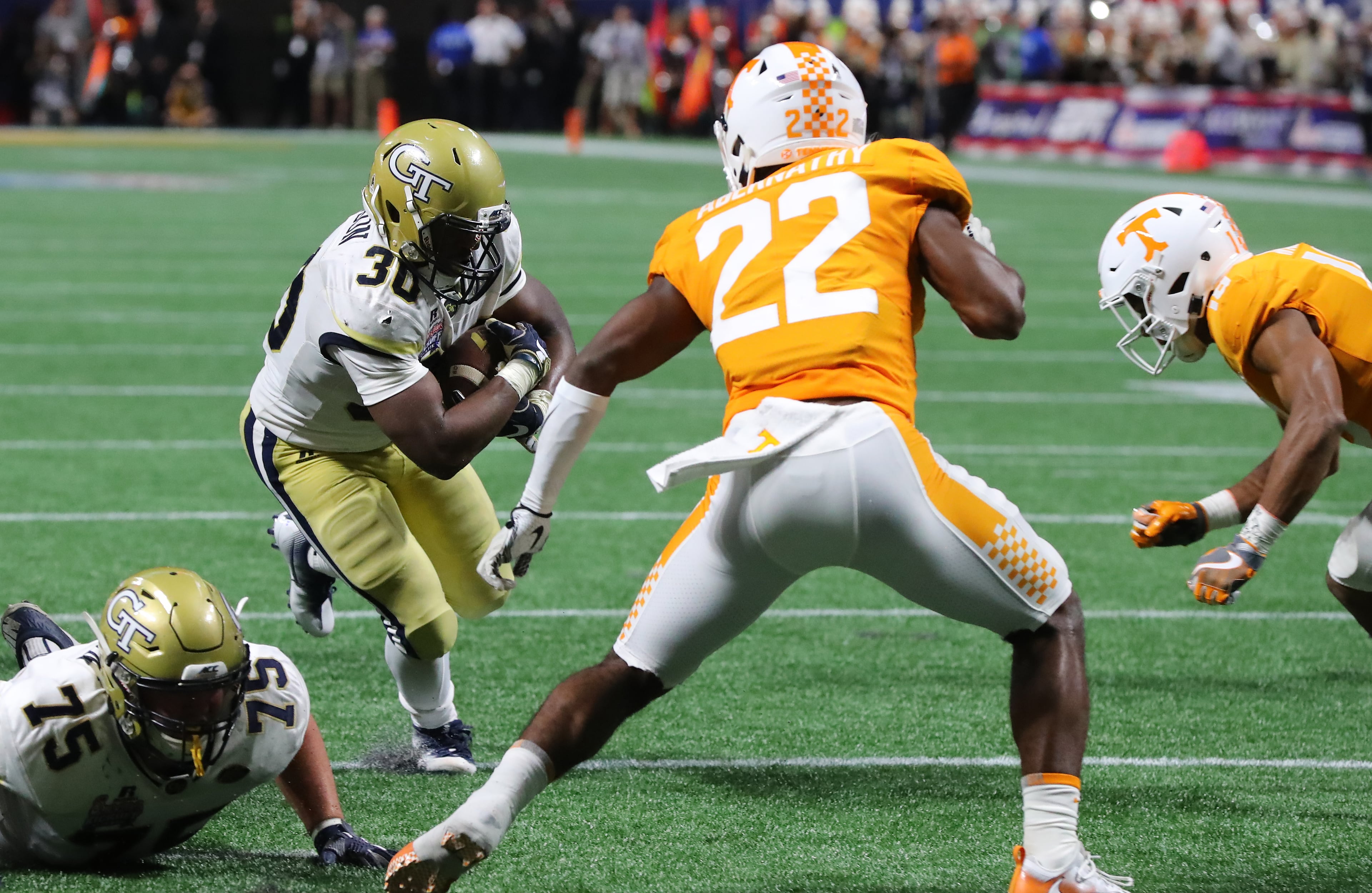 Jackets running back KirVonte Benson runs for yardage setting up a go ahead touchdown to take a 14-7 lead over Tennessee during the second quarter in a NCAA college football game on Monday, September 4, 2017, in Atlanta. Curtis Compton/ccompton@ajc.com