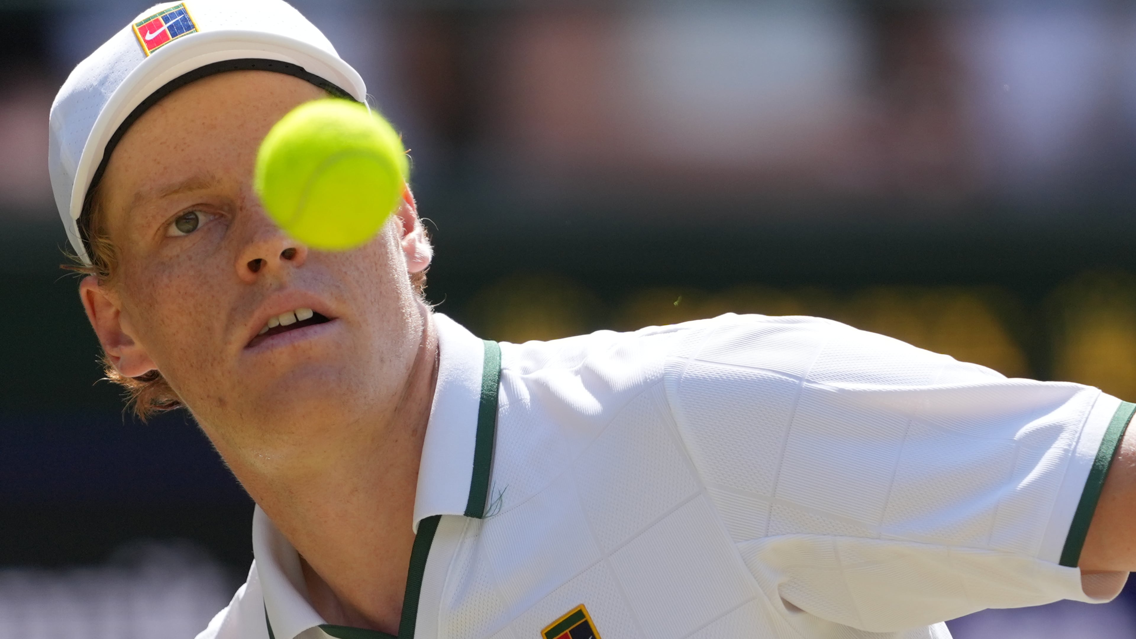 Jannik Sinner of Italy eyes the ball as he prepares to play a forehand against Jan-Lennard Struff of Germany in their quarter-final men's singles match at the Wimbledon Tennis Championships in London, Tuesday, July 7, 2026. (AP Photo/Kin Cheung)