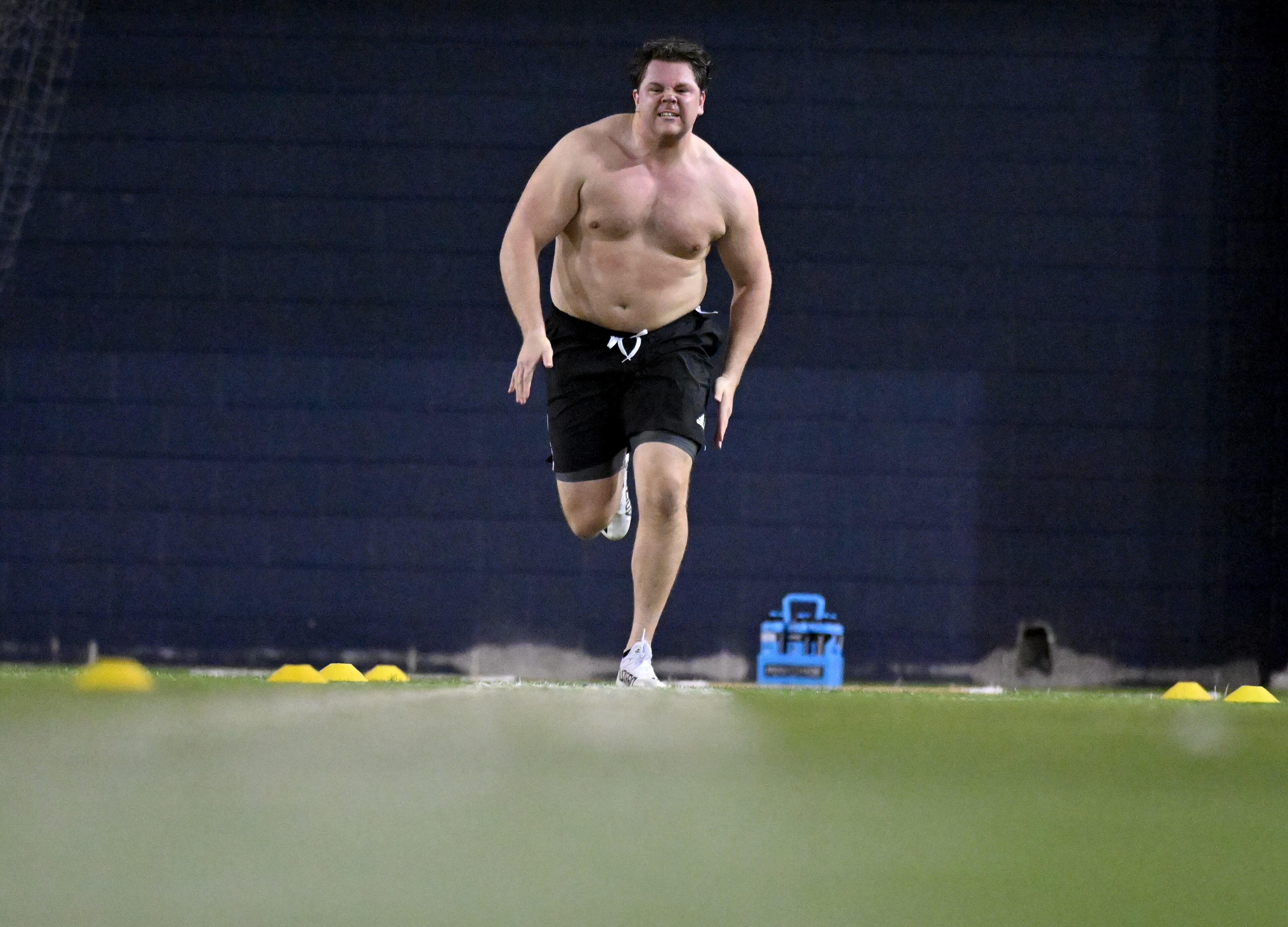 Offensive lineman Connor Scaglione runs the 40-yard dash during Georgia Tech Pro Day at the indoor practice facility. (Hyosub Shin / Hyosub.Shin@ajc.com)